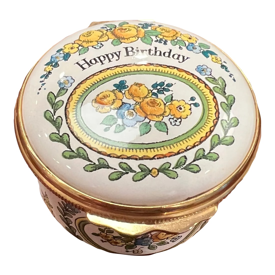 1980s Halcyon Days Enamel Box, Happy Birthday, English: Halcyon Days Enamel boxes are hand-enameled on copper with 24ct gold fittings. Box says Happy Birthday surrounded by flowers and greenery. It would make a special gift or wonderful start to a