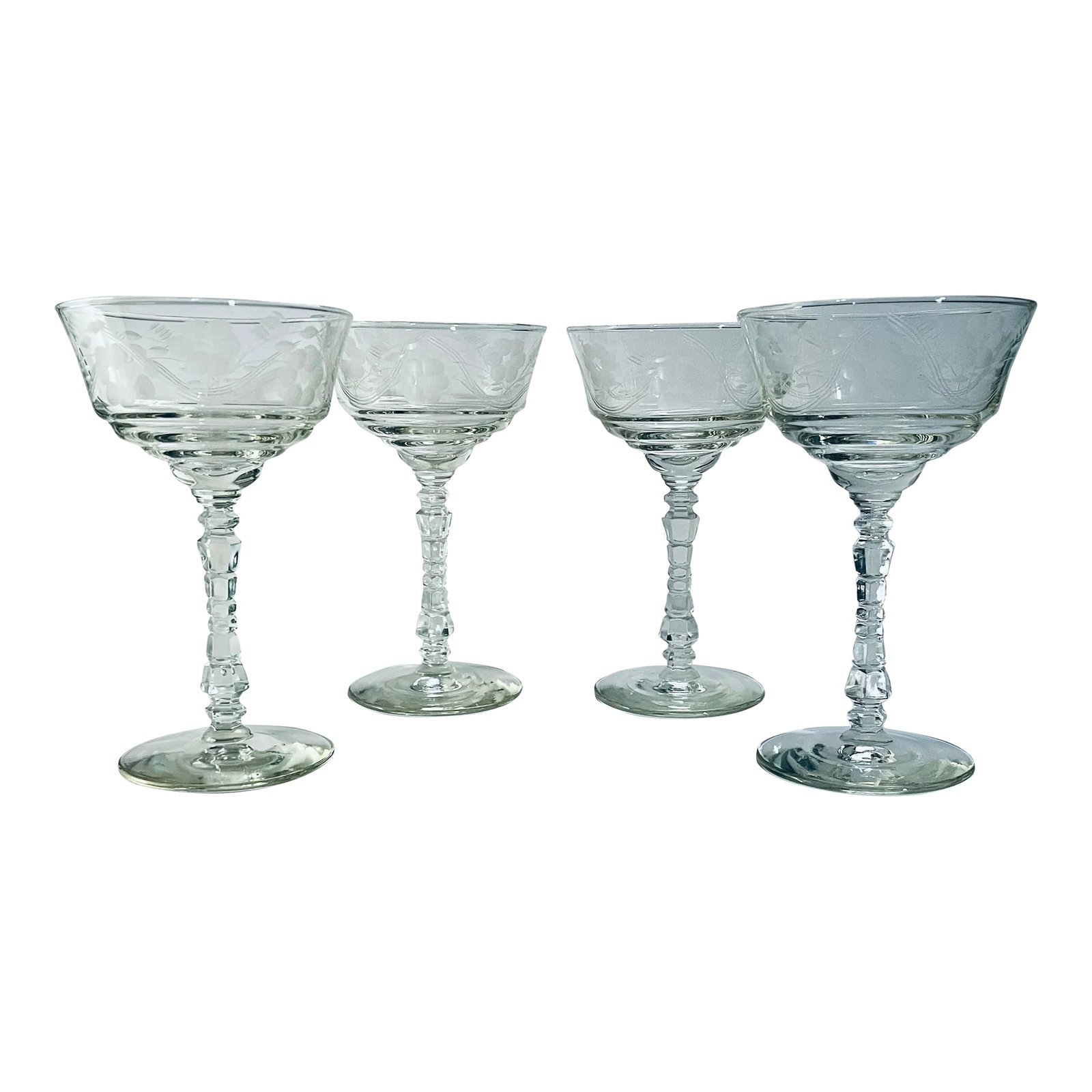 Mid 20th Century Libbey Rock Sharpe Champagne Coupes- Set of 4: A quartet of hand etched champagne saucers on faceted stems made by the Libbey Glass Company. Ships within 1-2 days using USPS. All items packed with care. Please contact us with any questions.