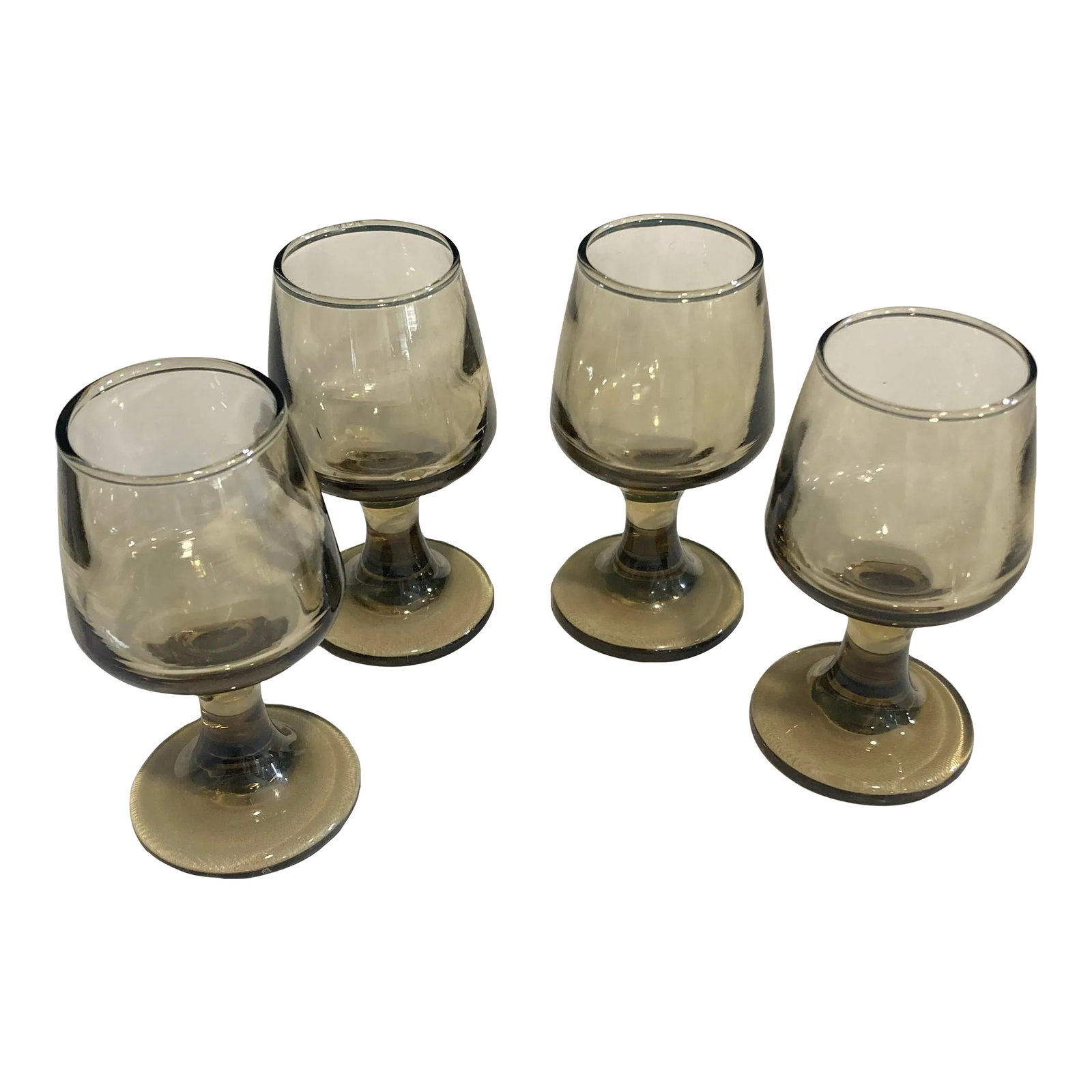 Mid-Century Small Smoke Cordial Glasses- Set of 4: Cute set of 4 small brandy snifters that are brown smoke colored. Perfect for cordials or shot glasses. Condition: Alterations: Original Condition Unaltered Imperfections: Some Imperfections