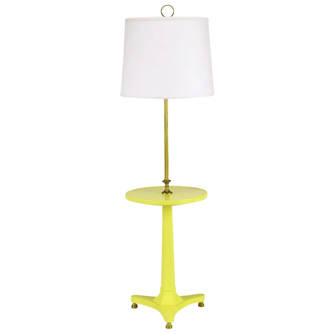 Yellow Lacquered Wood and Brass Regency Floor Lamp: Butter yellow lacquer over carved wood Regency floor lamp with reverse trefoil base, solid brass feet and tapered hexagonal pedestal supporting a 14.5" diameter round tabletop. Decorative brass