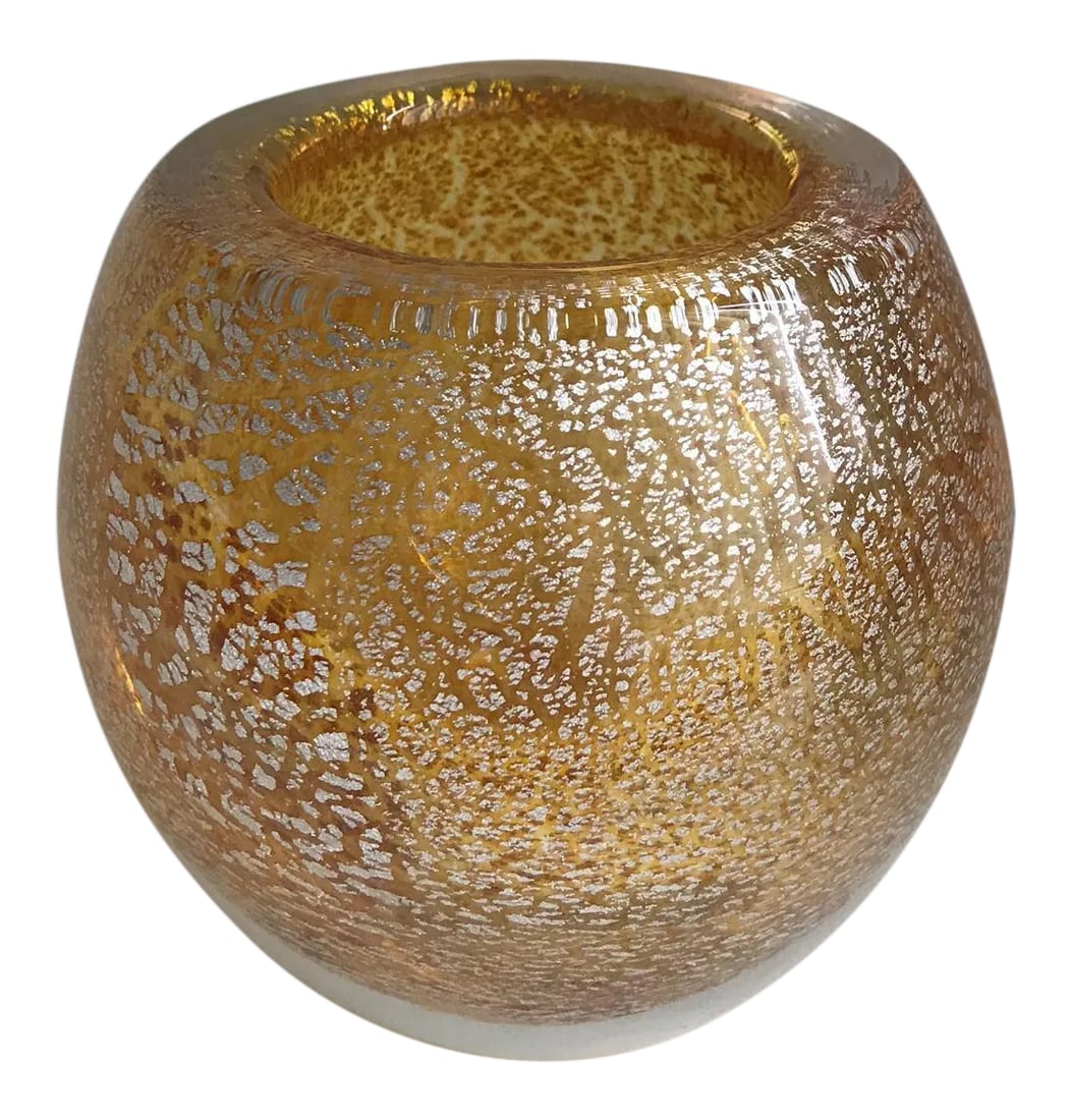 Italian Gold Glass Stardust Vase: A heavy glass vase of gold / pale amber glass with encased silver foil flecks. It is made in Italy using a centuries old Murano technique where a glass master rolls small .925 silver sheets onto a