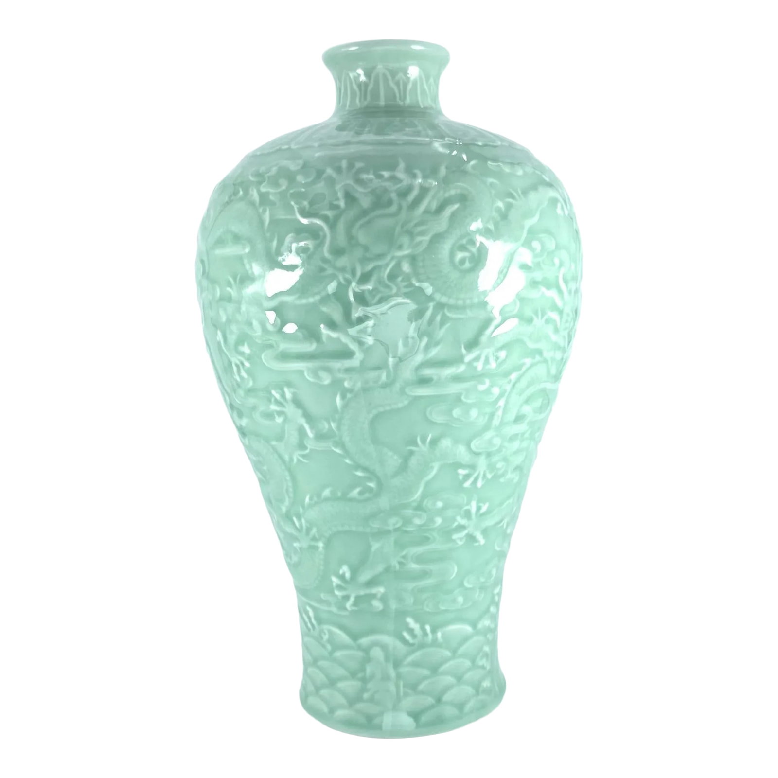 Pale Celadon Dragon Decorated Meiping Vase: Beautiful pale celadon vase, with molded decoration of a dragon rising from the waves chasing a pearl, 20th/21st century. Really a wonderful color. Condition: Alterations: Original Condition