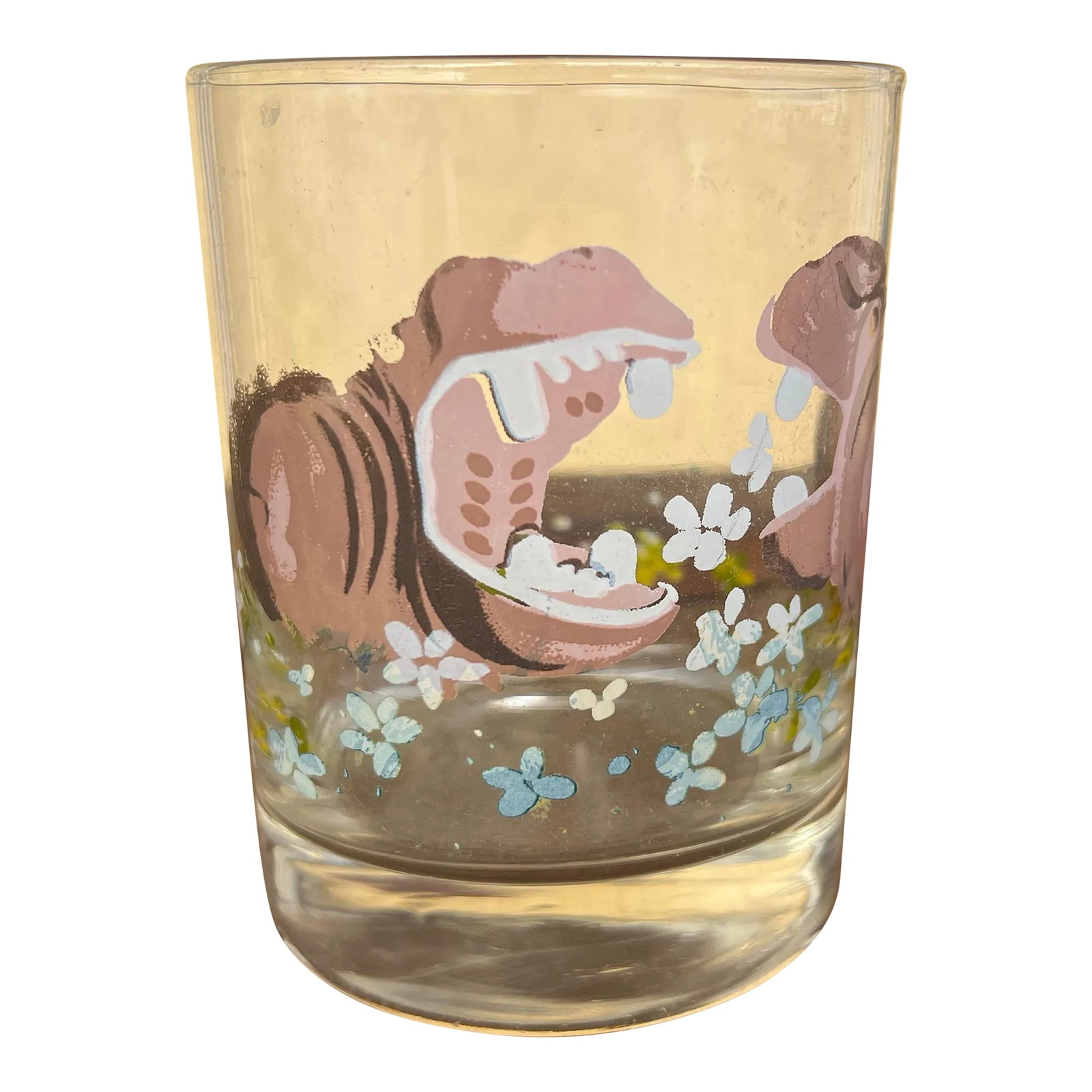 1960s Dorothy Thorpe Style Painted Hippos Glass: 1960s Double old fashion glass. Hand painted hippos in a field of white daisies. No signature or markings. Condition: Alterations: Original Condition Unaltered Imperfections: Some Imperfections
