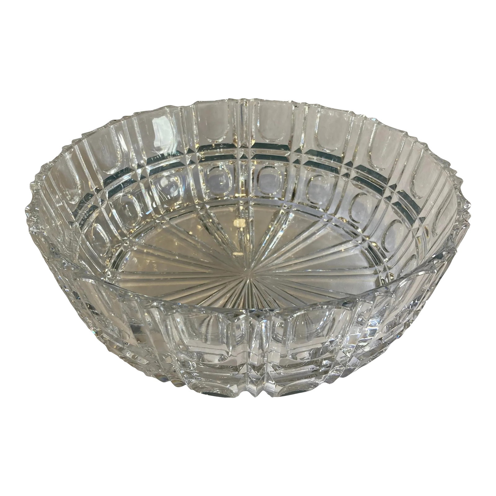 Early 20th Century Art Deco Cut Glass Serving Bowl: Beautiful Art Deco style bowl from the early 20th century. It has cut glass thumbprint style etchings and a star center in the bottom of the bowl. Condition: Alterations: Original Condition Unaltered