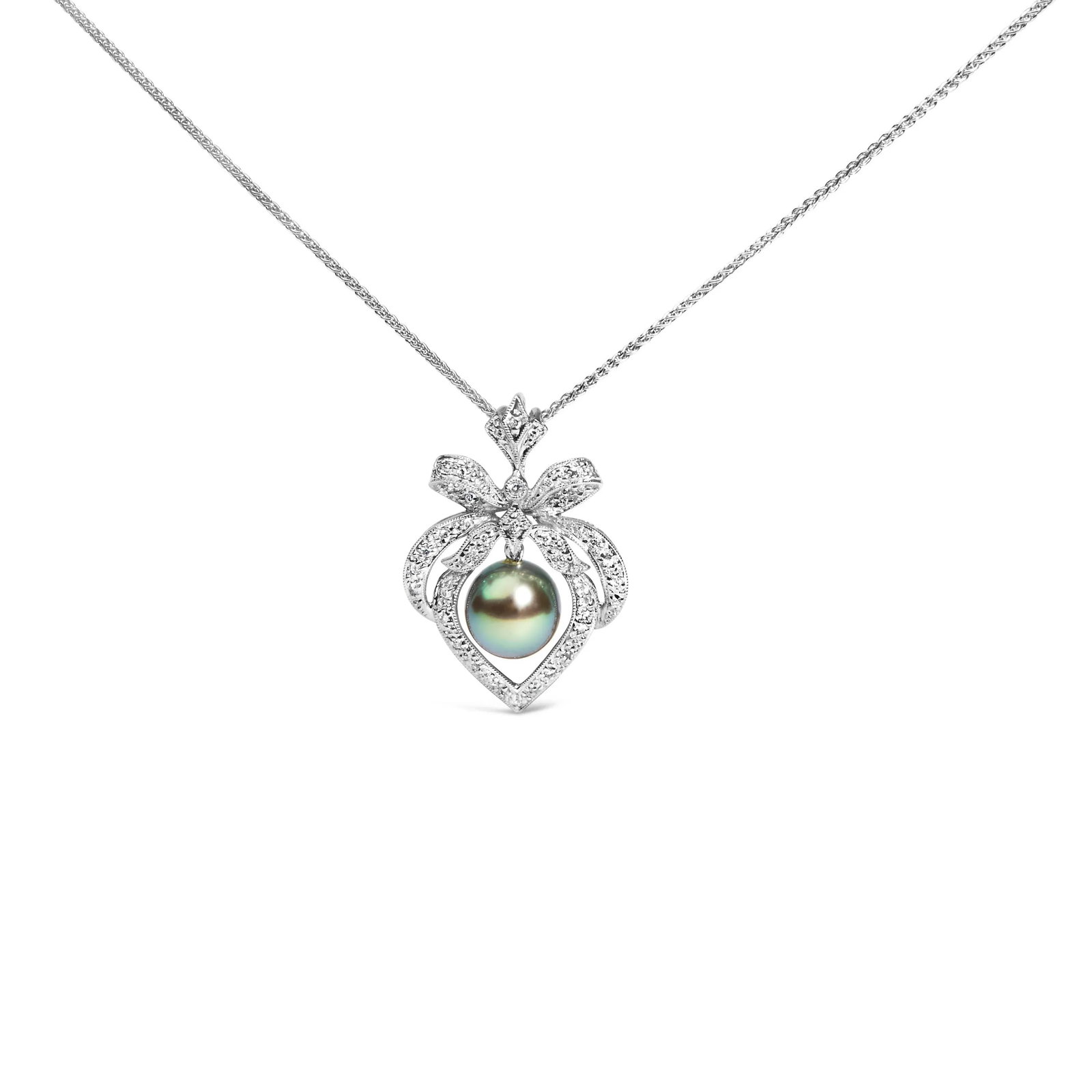 18K 3/4 Cttw Diamond and 12.5 MM Cultured Black Tahitian Pearl Heart Pendant Necklace (G-H Color, SI: Indulge in the timeless elegance of this exquisite pendant necklace, where the radiance of 18K white gold, enhanced by a rhodium finish, converges with the mystique of a deep-sea gem. Centered with a 