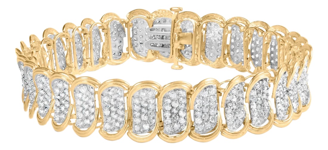 10k Yellow Gold 5.00 Cttw Diamond Oval Banded Link Bracelet (I-J Color, I1-I2 Clarity) - 7" Inches: Embark on a journey of elegance with this unparalleled bracelet, where the radiance of 10k yellow gold meets the serene sheen of white rhodium in an opulent dance of contrasts. This piece artfully