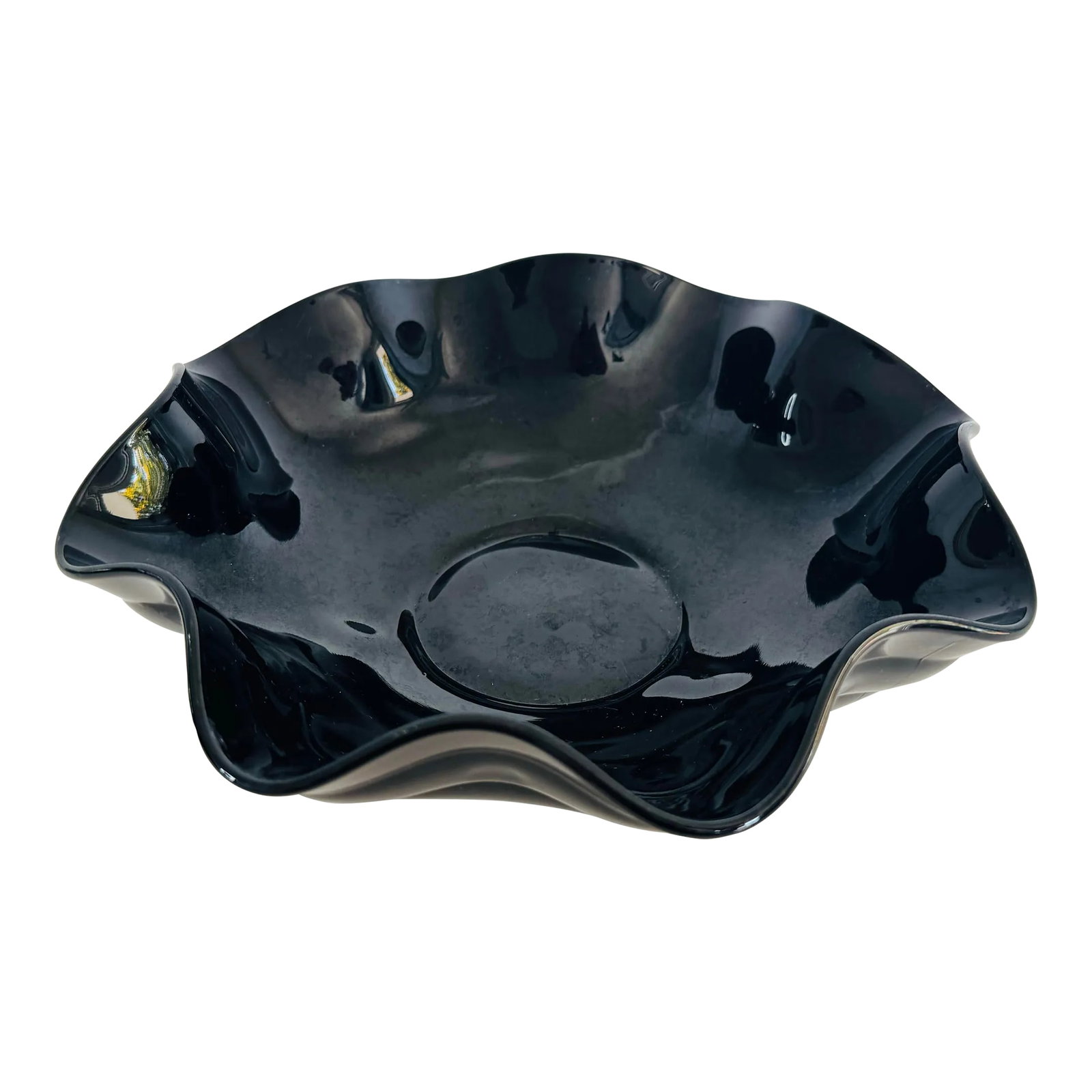 Vintage 1930s Scalloped Edge Black Glass Footed Bowl: Vintage 1930s Scalloped Edge Black Glass Footed Bowl. Large bowl with three feet. Outside has a ribbed design. No marks. Condition: Alterations: Original Condition Unaltered Imperfections: Some