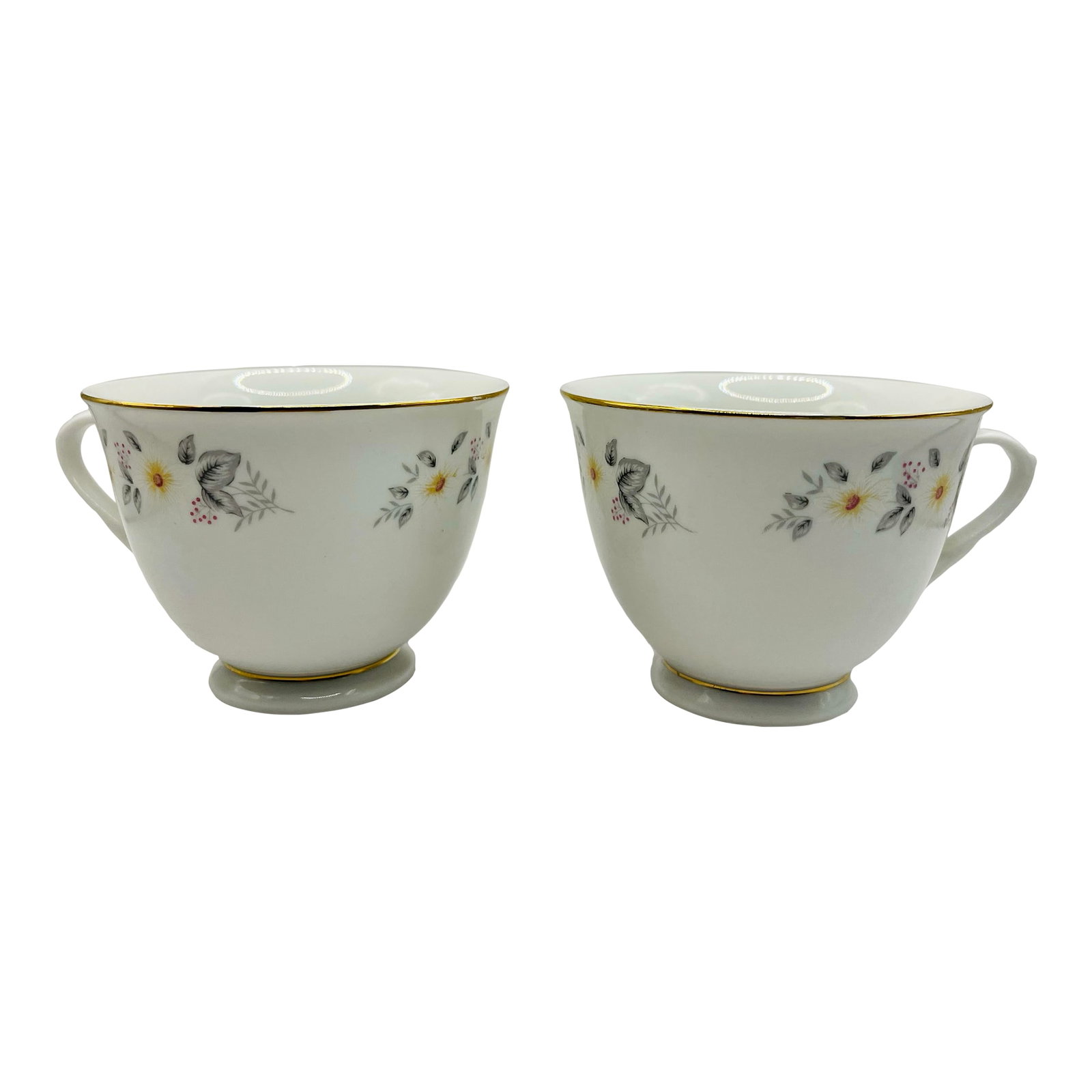 Vintage Snow-Flower Gold Trimmed Teacups- A Pair: A pair of vintage china teacups wreathed with a circle of pale frosted snow flowers amid grey foliage and sprigs of pink berries. Holds 6 ounces Ships within 1-2 days using USPS. All items packed