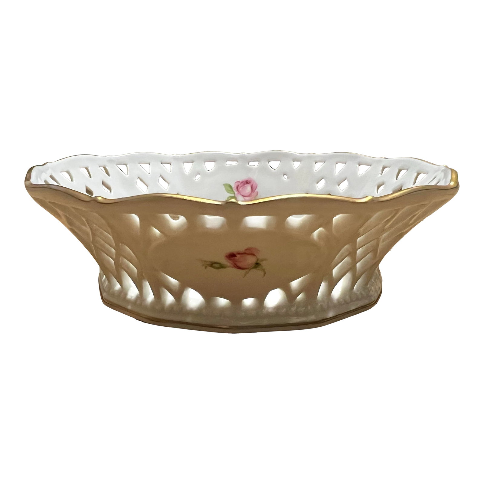 Vintage Oscar De La Renta Decorative Bowl: This beautiful bowl from Oscar de la Renta is a must-have for any collector of fine china. Made in Germany, it features a stunning flower theme that is sure to impress any guest. The attention to