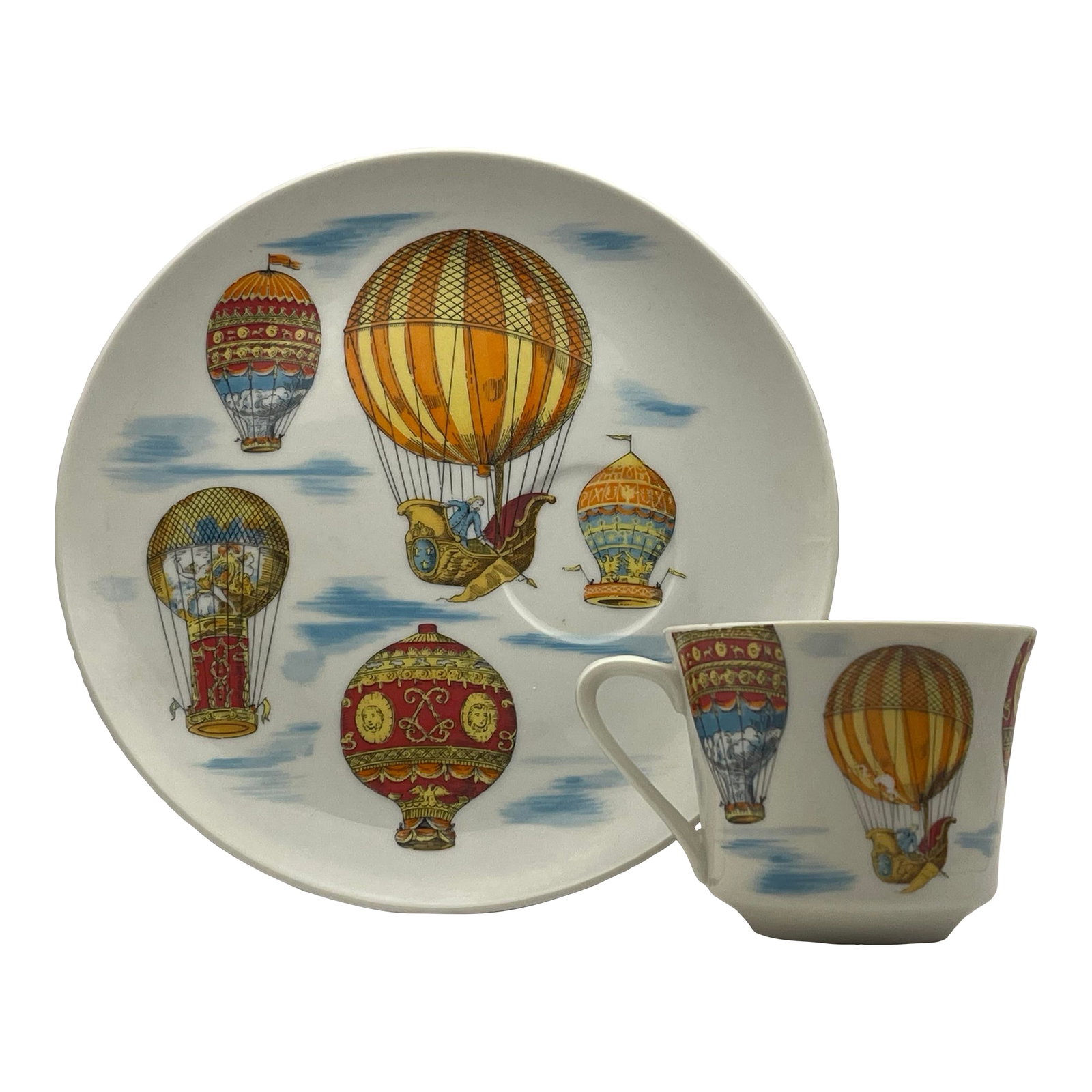 Vintage Hot Air Balloon Cup & Plate: A whimsical china snack set featuring a collection of early hot air balloons. -Plate measures 8 1/4 inches in diameter. -Cup measures 3 inches tall, 4 1/2 inches from handle to rim and 2 inches wide
