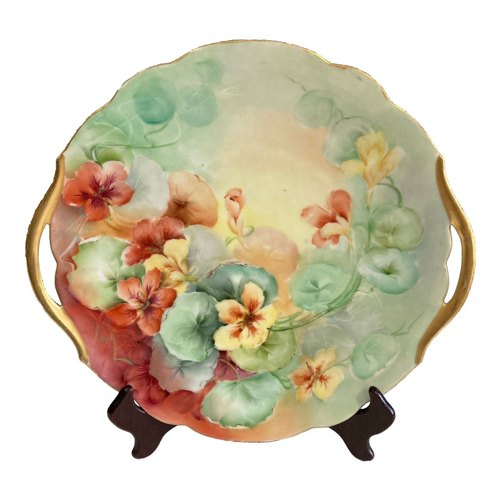 Antique Hand-Painted Bavarian Floral Cake Plate With Gold Trim Handles: An elegant antique Bavarian porcelain cake plate featuring hand-painted floral decoration, integrated handles, and gilt trim. The beautifully executed floral artwork and gold detailing reflect the
