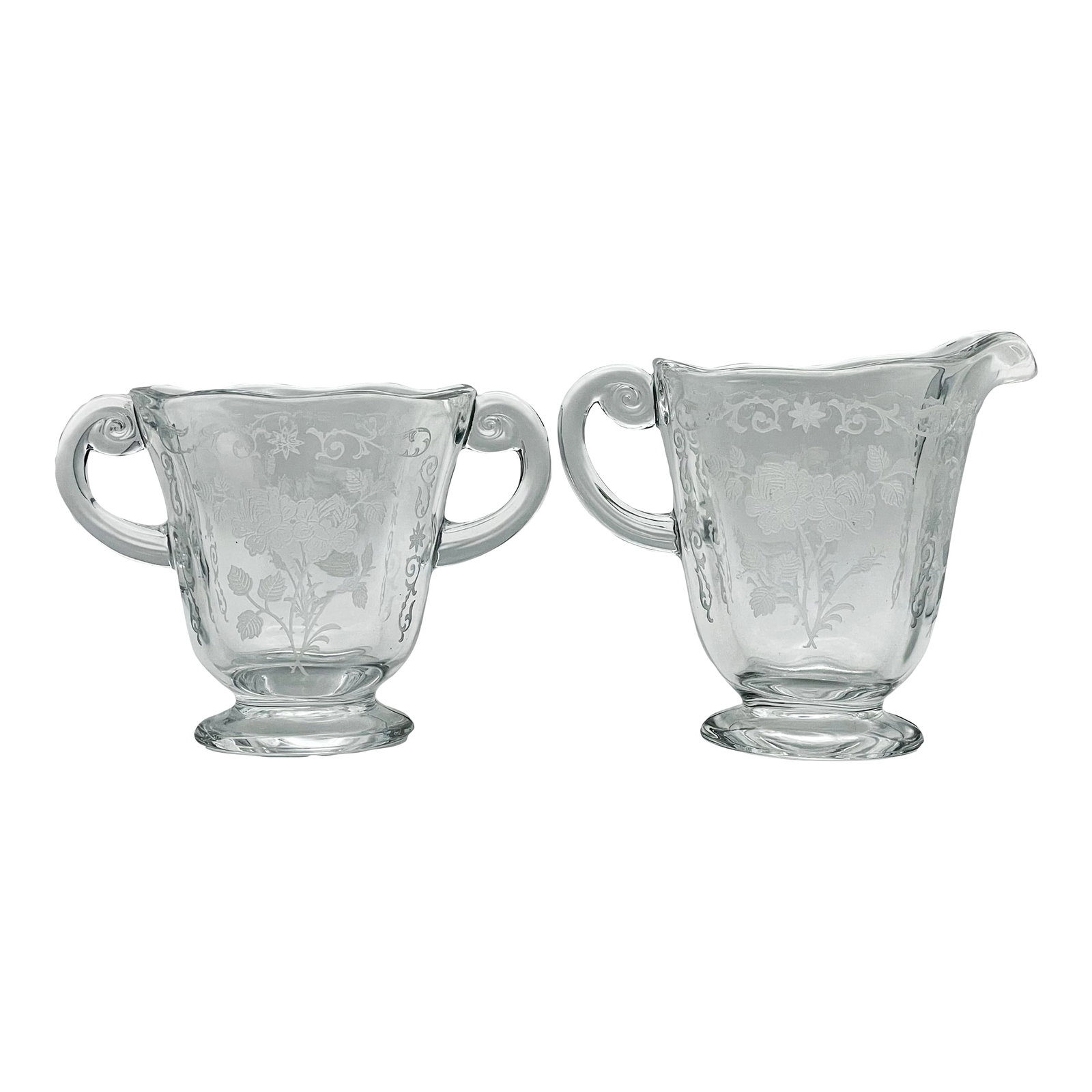 1930s Fostoria "Midnight Rose" Creamer & Open Sugar Bowl: An beautiful example of early 20th century midwestern etched glass made by the Fostoria Glass Company. The pattern features a spray of roses in a border of scrollwork leaves dotted with daisies on a