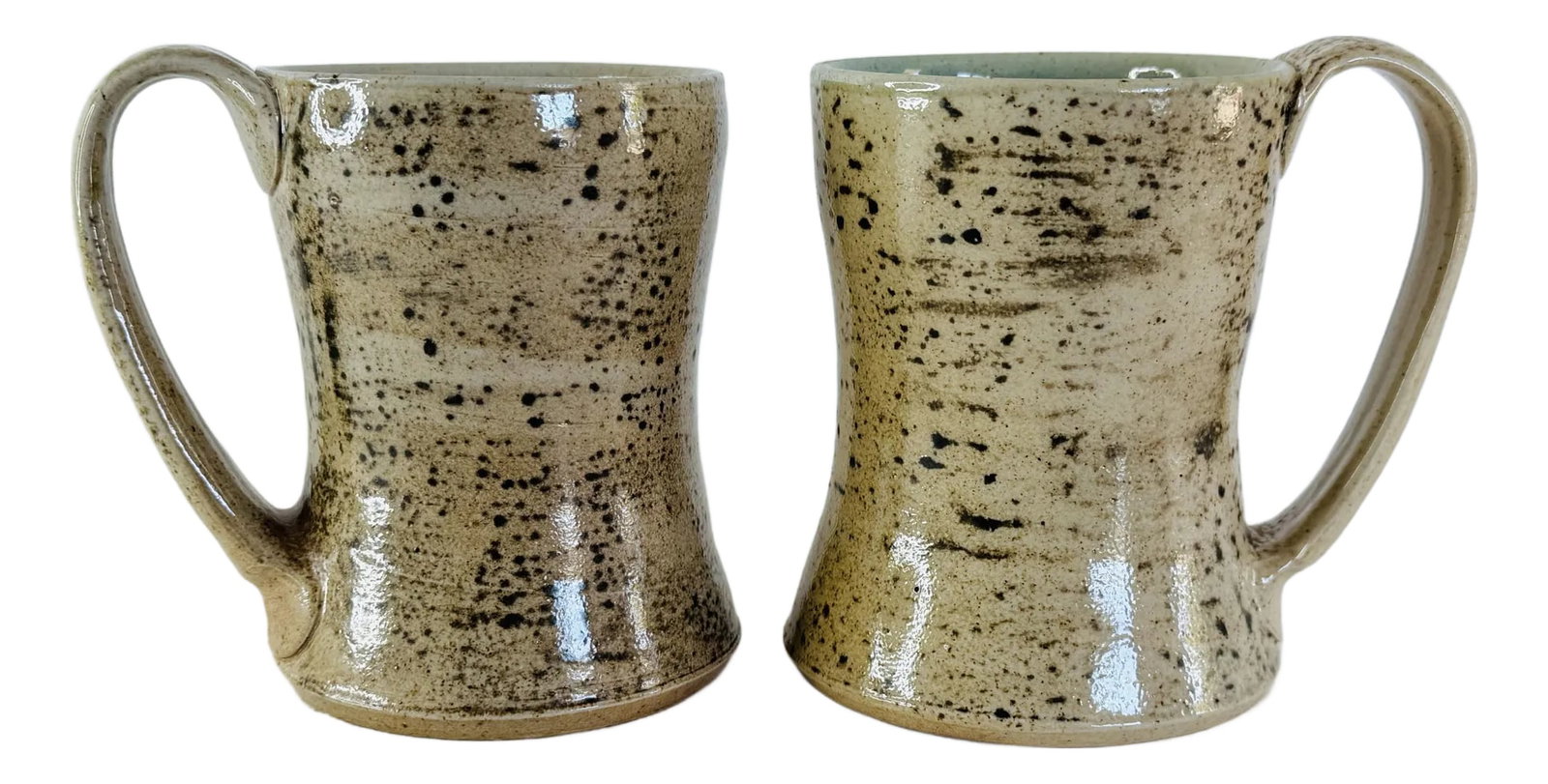 1990s Art Studio Pottery Brown Speckled Handled Mugs, a Pair: 1990s Art Studio Pottery Brown Speckled Handled Mugs, a Pair. Hand crafted pottery mugs, with nice big handles. Green speckled interior. Holds 10ozs. Marked. Condition: Alterations: Original