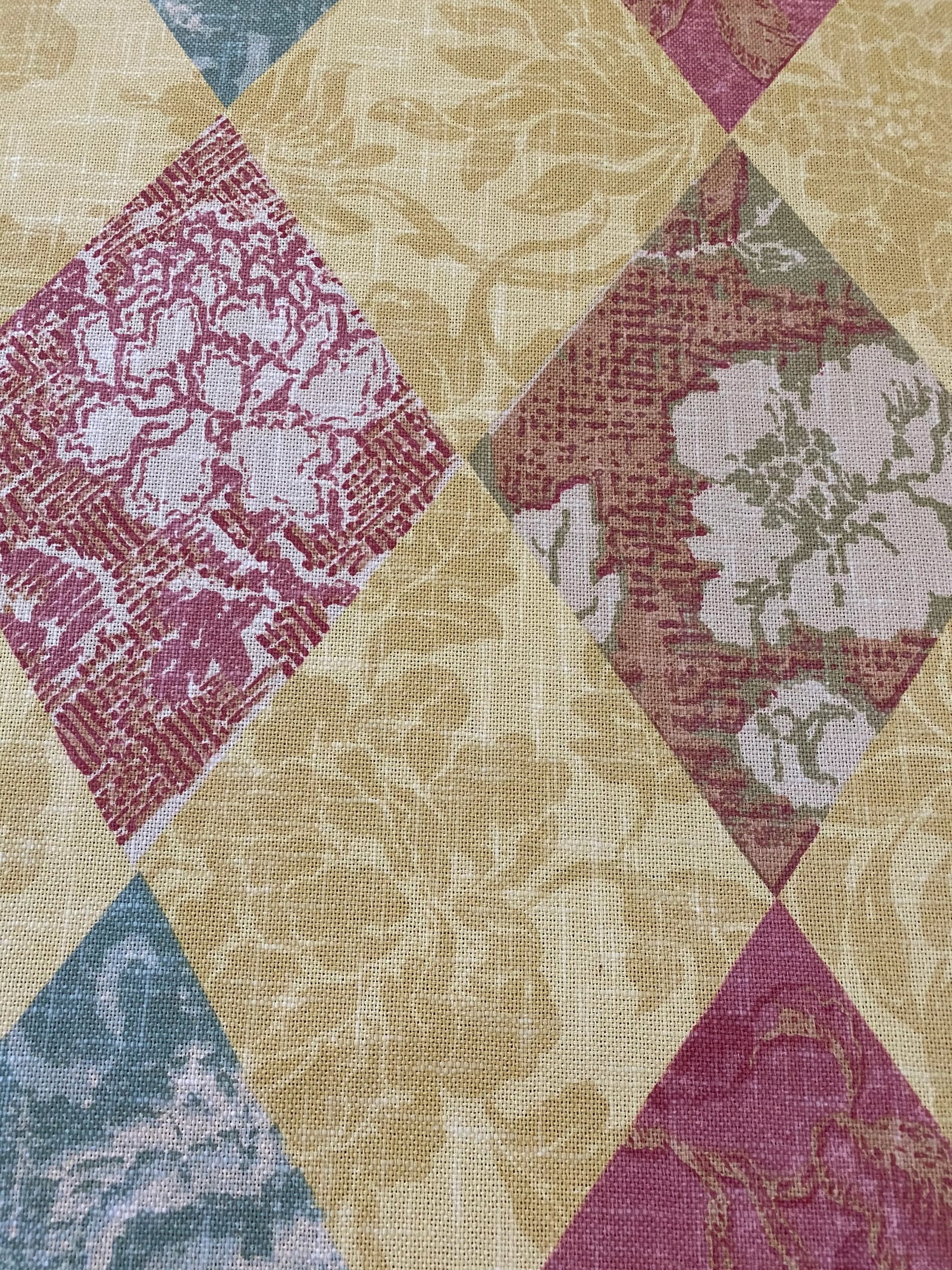 Travers Linen Fabric- 11 Yards: 11 yards of a lovely travers linen printed "Ming patchwork" in rose, green and aubrrgine in yellow ground. 25" vertical repeat with half drop. Condition: Imperfections: No Imperfections Condition