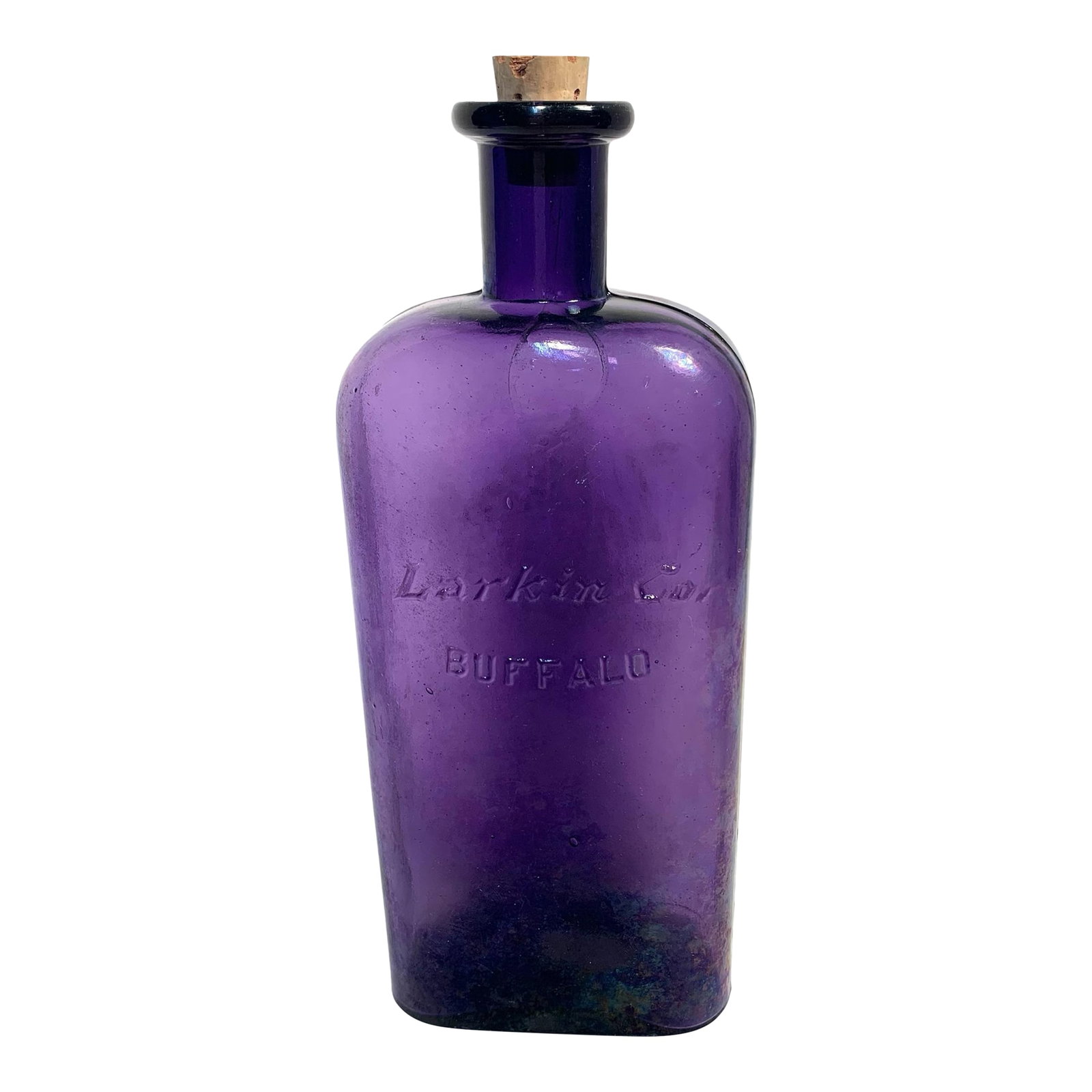 Early 20th Century Larkin Co. Amethyst Glass Bottle Art Nouveau: This early 20th-century amethyst glass bottle was produced by the Larkin Company of Buffalo, New York, known for its household and toiletry products distributed through mail-order catalogs. The bottle