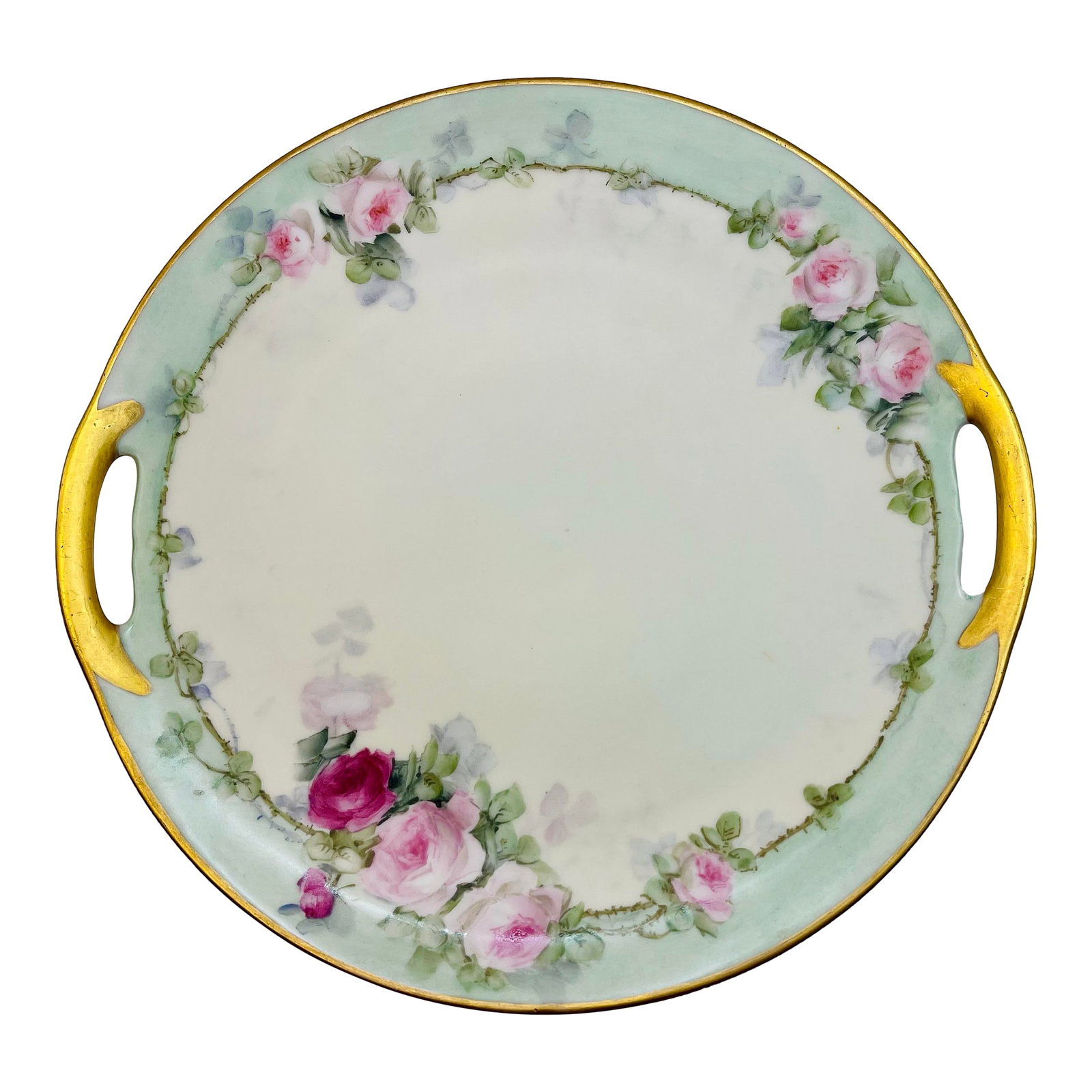 Early 20th Century Mint & Pink Pastel Rose Plate: A classically designed small serving plate with a light green border punctuated with roses in delicate shades of pink and small gold handles. Ships within 1-2 days using USPS. All items packed with