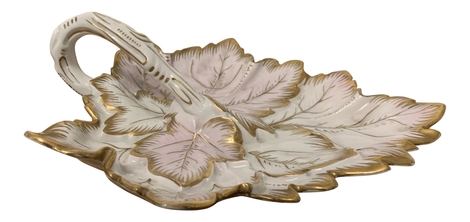 Vintage Early 20th Century Leaf-Shaped Dish With Handle: Elegant porcelain leaf-shaped dish with a curved handle and decorative pattern of overlapping leaves hand-painted with gold and pink accents. Probably Austrian or German, and probably early 20th