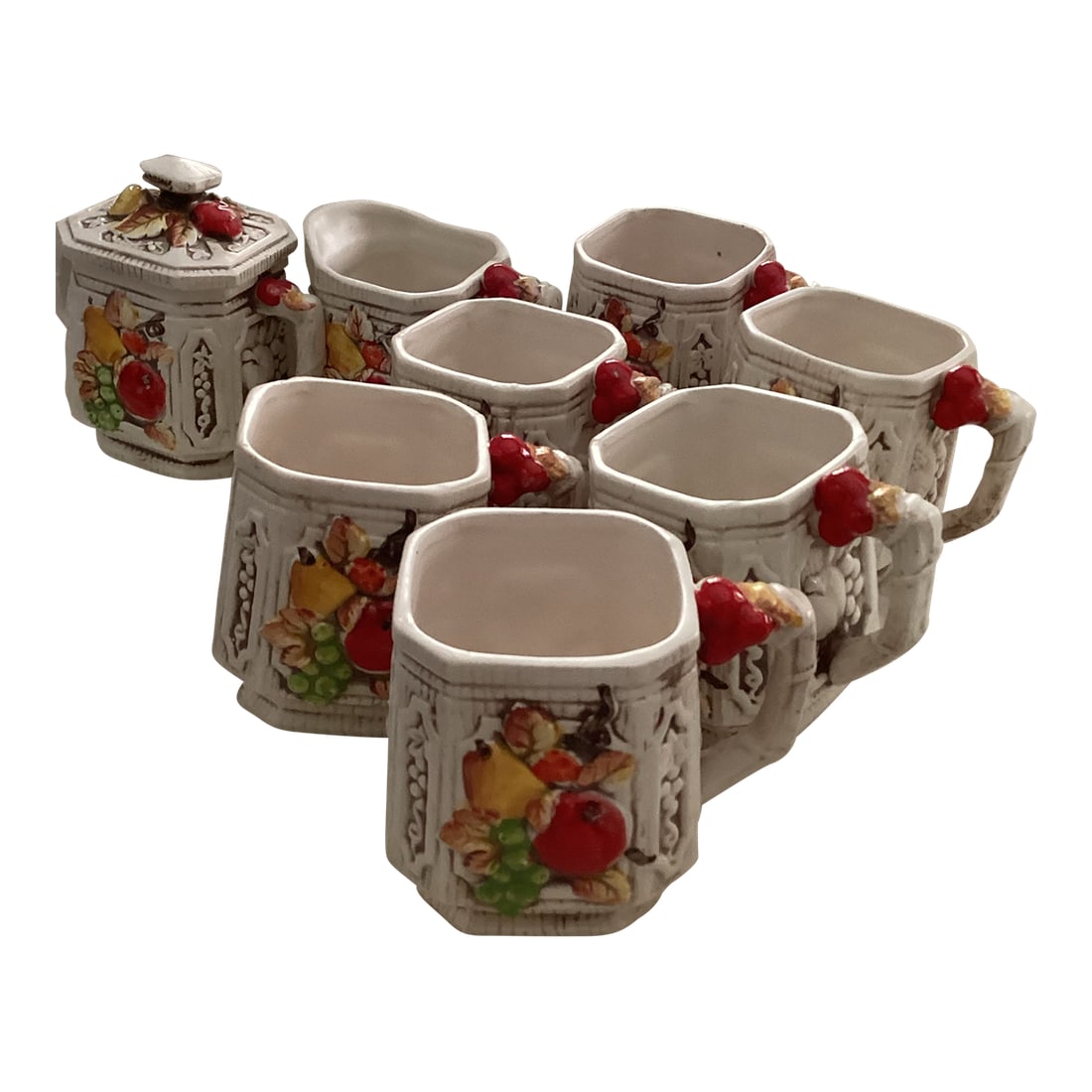1960s Trends Japanese Fruit Sugar/Creamer With 6 Cups- 8 Pieces: This eight piece set of cups, creamer, and sugar bowl is a stunning compliment to any kitchen or dining area. They have a retro look about them. Each piece is in excellent condition. The colors are vi