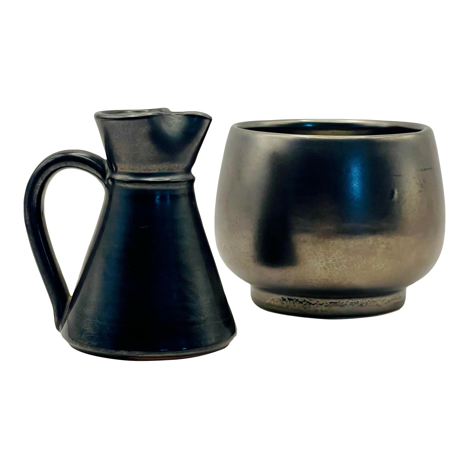 Mid 20th Century Prinknash Grey Cream and Sugar Set: The Prinknash Abbey Pottery was founded in 1942 by the monks when they found a seam of clay during some building work. Their work is typically red earthenware, often with a metallic glaze. -Creamer