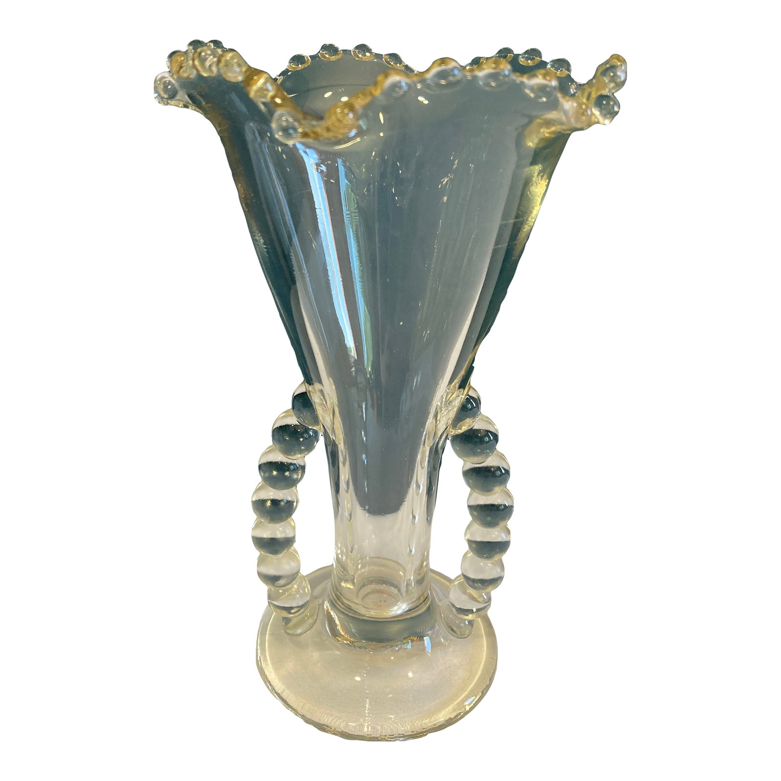 Clear Fenton Glass Vase With Ruffled Rim and Loop Handles: This elegant clear glass Fenton vase, features a scalloped beaded rim and unique looped handles that frame its flared silhouette. A beautiful example of vintage finds, this piece is ideal for use as