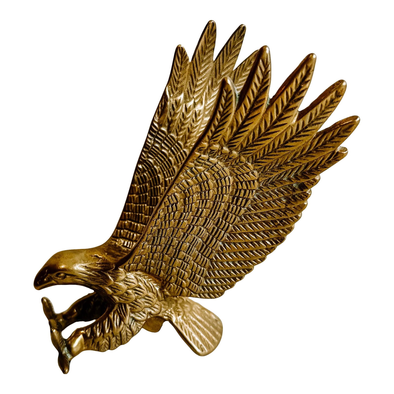 Vintage Brass Eagle in Flight Sculpure of Finial Piece: Vintage Brass eagle in flight sculpture. Would be great as a bookend or mounted. It has an opening on the bottom that could turn it into a hood ornament or Finial of some kind. In great condition. No 