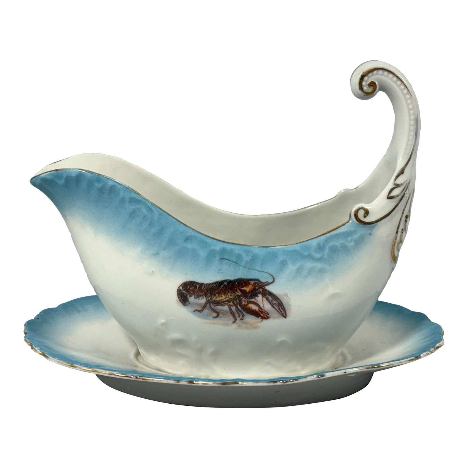 19th Century Imperial Crown China Antique Lobster Gravy Boat: Antique blue and white porcelain gravy boat with attached underplate features a handpainted lobster design with gilt trim on the rim and handle. This piece was produced sometime between 1883-1914 and 
