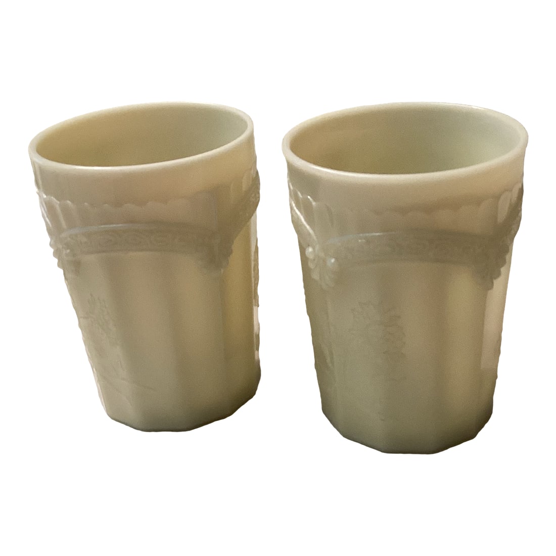 Pair of Vintage Westmoreland Milk, Glass Tumblers With Chrysanthemum and Lincoln Swag Detail Detaili: These elegant vintage milk glass tumblers are delightful. Find for any collector. They feature a classic Lincoln swag detail around the rim and intricate chrysanthemum motif. They bring a touch of mid