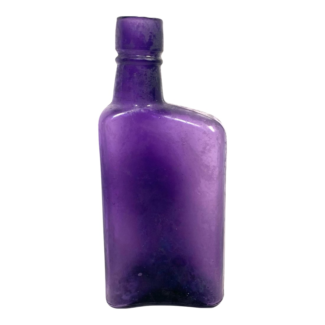 Early 20th Century Amethyst Glass Bitters Bottle Apothecary Style: This early 20th-century amethyst glass bottle likely once held medicinal bitters or tonic. It features a rectangular body, offset neck, and applied lip typical of transitional apothecary glass from
