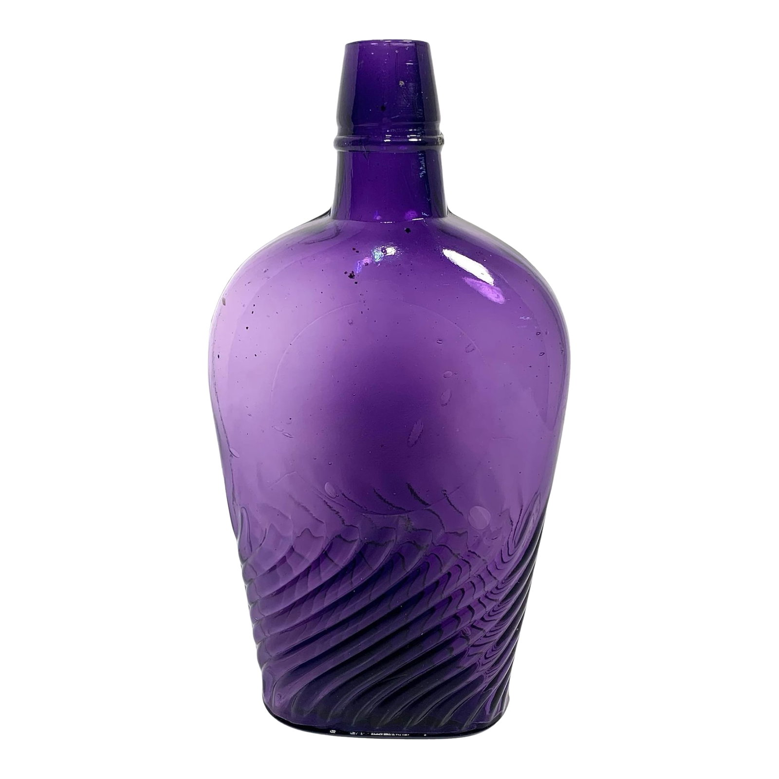 Circa 1900 Amethyst Swirl Glass Whiskey Flask Bottle: This antique mold-blown glass whiskey flask dates to around 1900 and features a distinctive diagonal swirl pattern. The piece retains its original cork-style neck and exhibits air bubbles typical of e