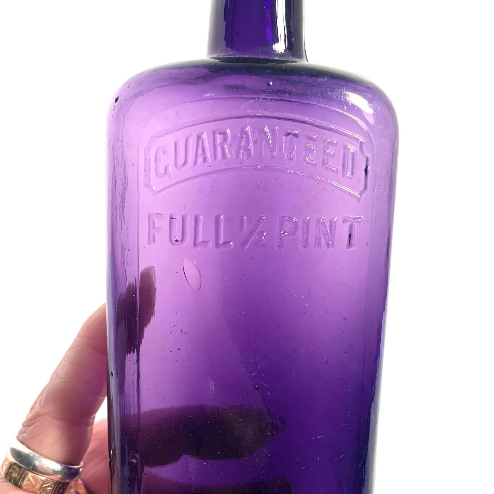 Early 20th C. Amethyst Embossed Half-Pint Whiskey Bottle - 12