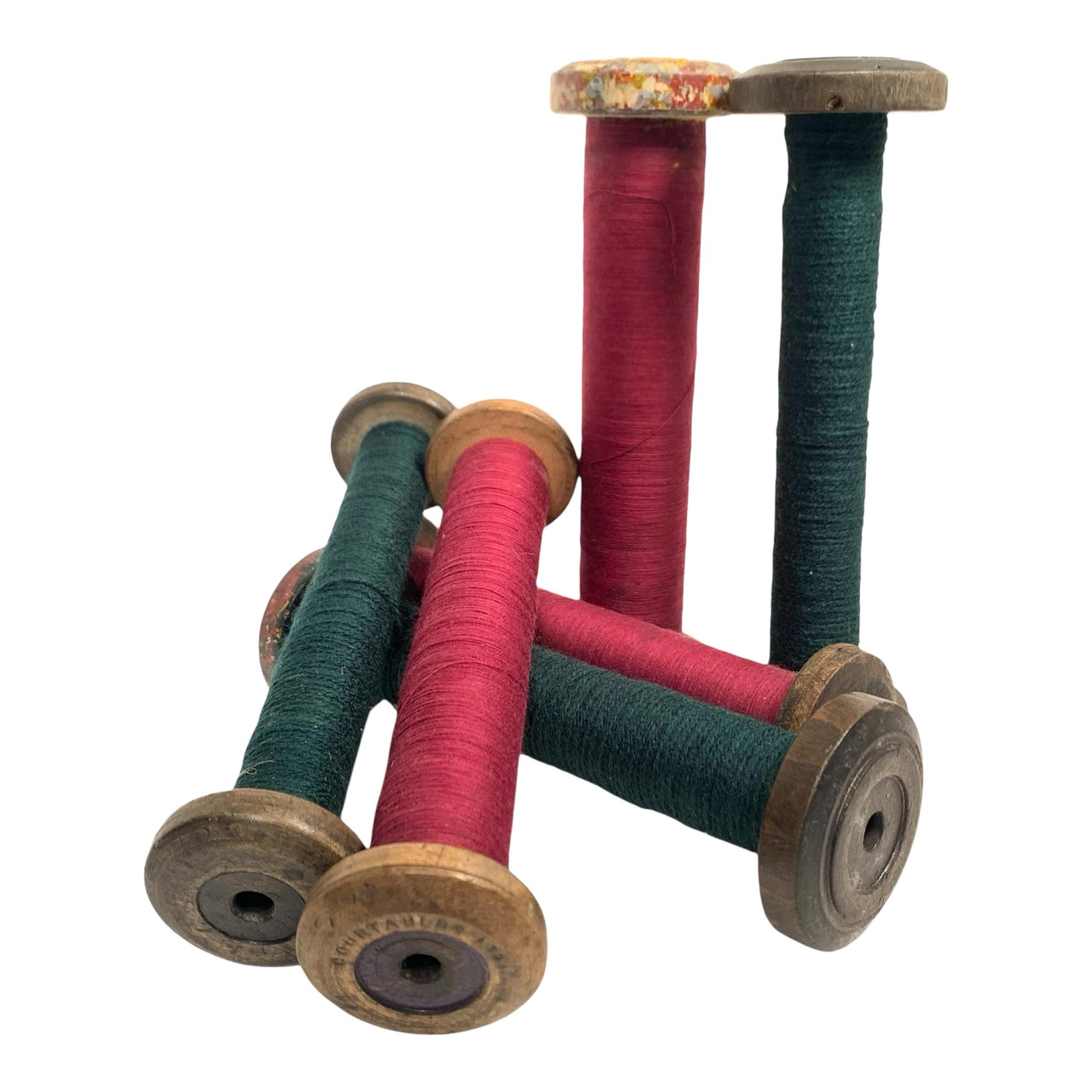 Circa 1950 Wood and Metal Textile Mill Bobbins Set of Six Red and Green: This set of six vintage textile mill bobbins dates to around 1950 and reflects the craftsmanship of mid-century industrial weaving. Each wooden spool varies slightly in form and finish, with several f