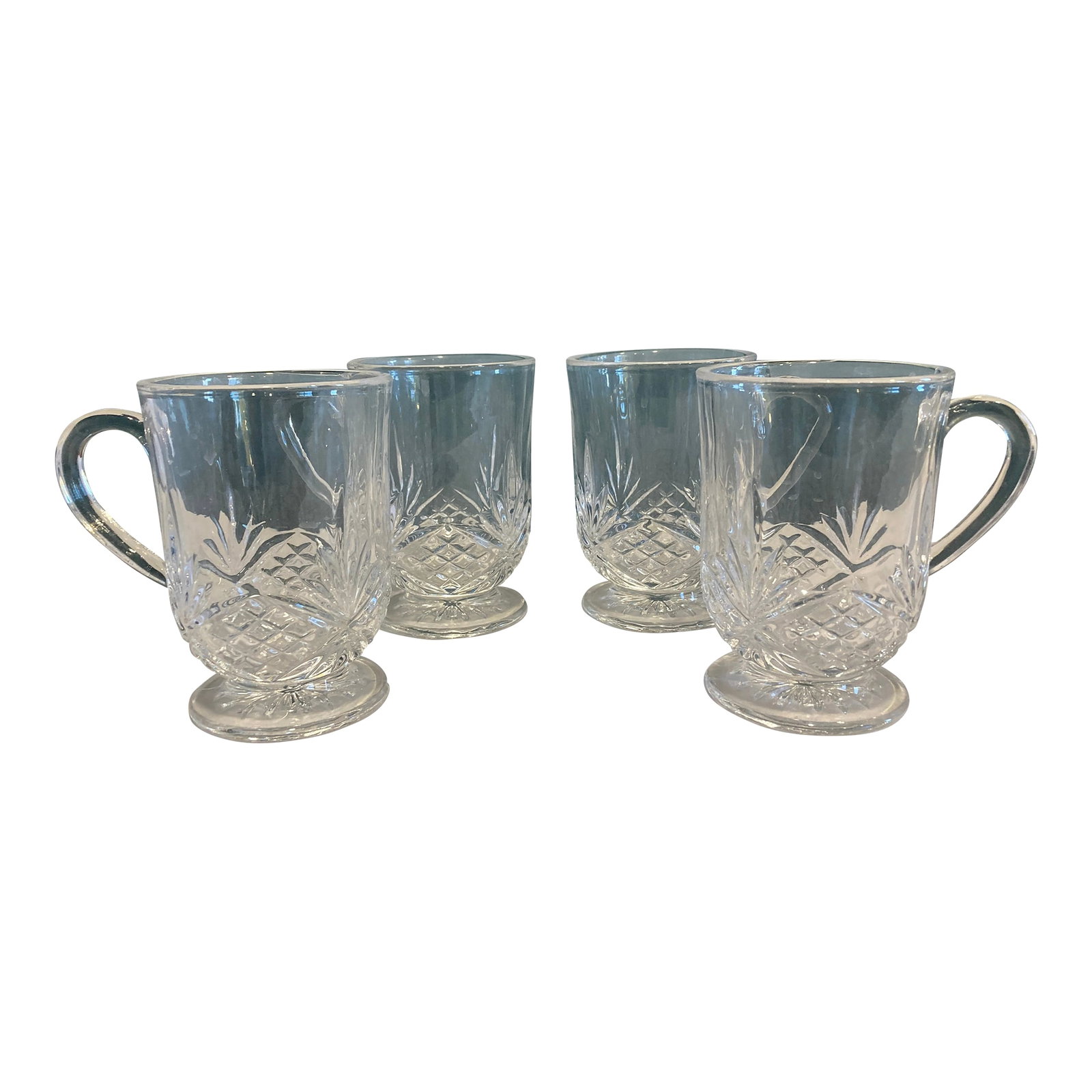 Vintage Etched Glass Coffee Cups, Set of 4: A refined set of 4 clear cut glass mugs featuring beautifully etched patterns and pedestal bases. These vintage finds bring sophistication to any table setting with their timeless design and