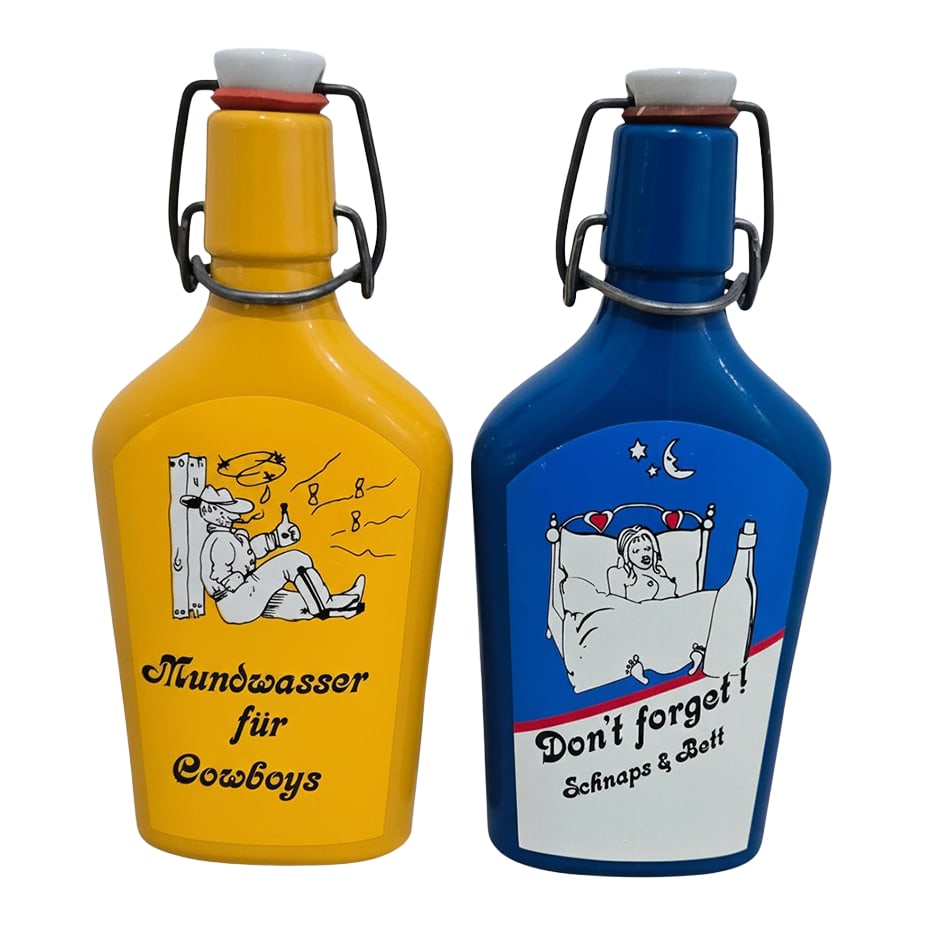 Vintage German Cartoon Schnapps Bottles - "Don't Forget" & "Mouthwash for Cowboys" Pair: Vintage German Cartoon Schnapps Bottles - Humorous Pair for Your Bar Playful and a little cheeky, this vintage pair of German ceramic schnapps bottles brings instant character to a bar cart, back