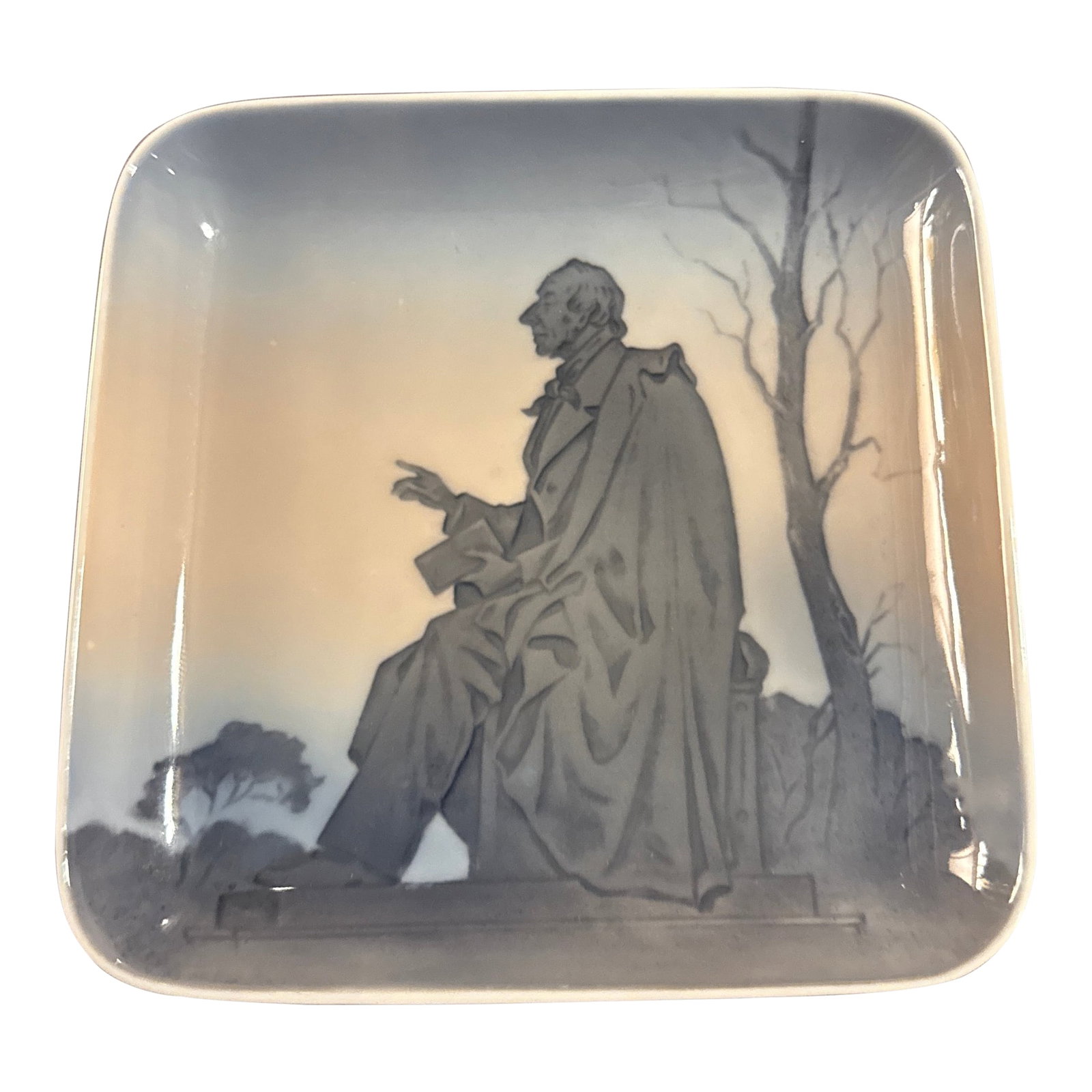 Bing & Grondahl Porcelain Dish - Hans Christian Andersen: Bing & Grondahl porcelain dish or catchall plate featuring a raised relief of Danish author Hans Christian Andersen. Bing & Grondahl was a Danish ceramics factory founded in 1853 and known for