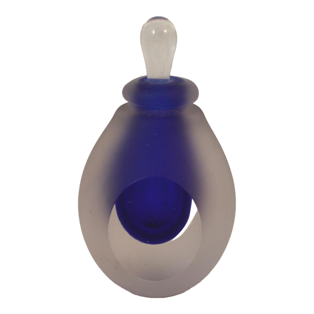 Mid Century Modern I. Rice Cobalt Blue, Frosted & Clear Glass Teardrop Shape Perfume Bottle: Vintage Irving Rice & Co. Cobalt Blue & Clear Glass Perfume Bottle This Mid-Century Modern perfume bottle is teardrop-shaped. It has a cobalt blue center that is encased in a frosted and clear glass b