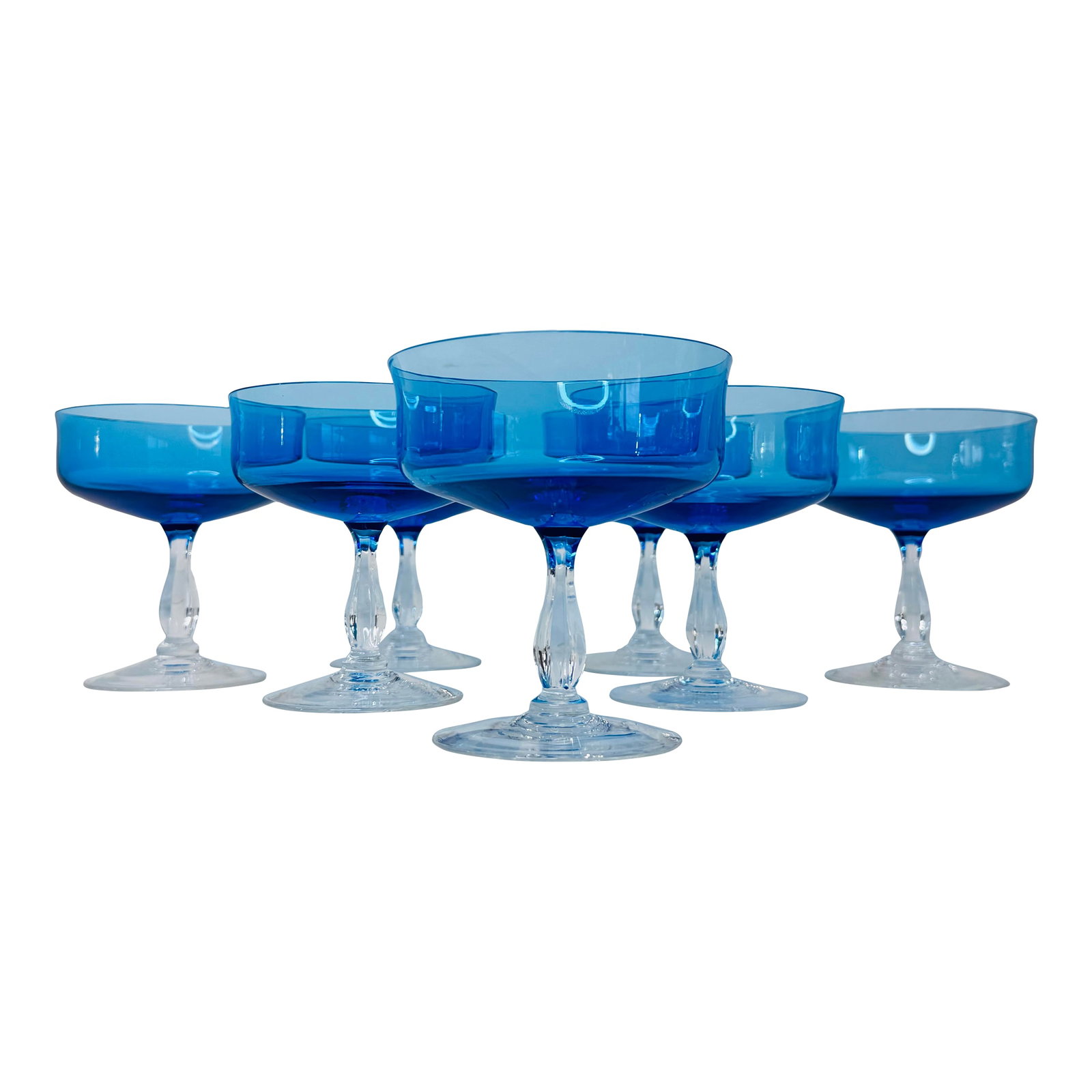 Vintage 1960s Periwinkle Blue Glass Coupes, Set of 7: Vintage 1960s Periwinkle Blue Glass Coupes, Set of 7. Excellent condition with a beautiful color and clear base. No makers marks Condition: Alterations: Original Condition Unaltered Imperfections: