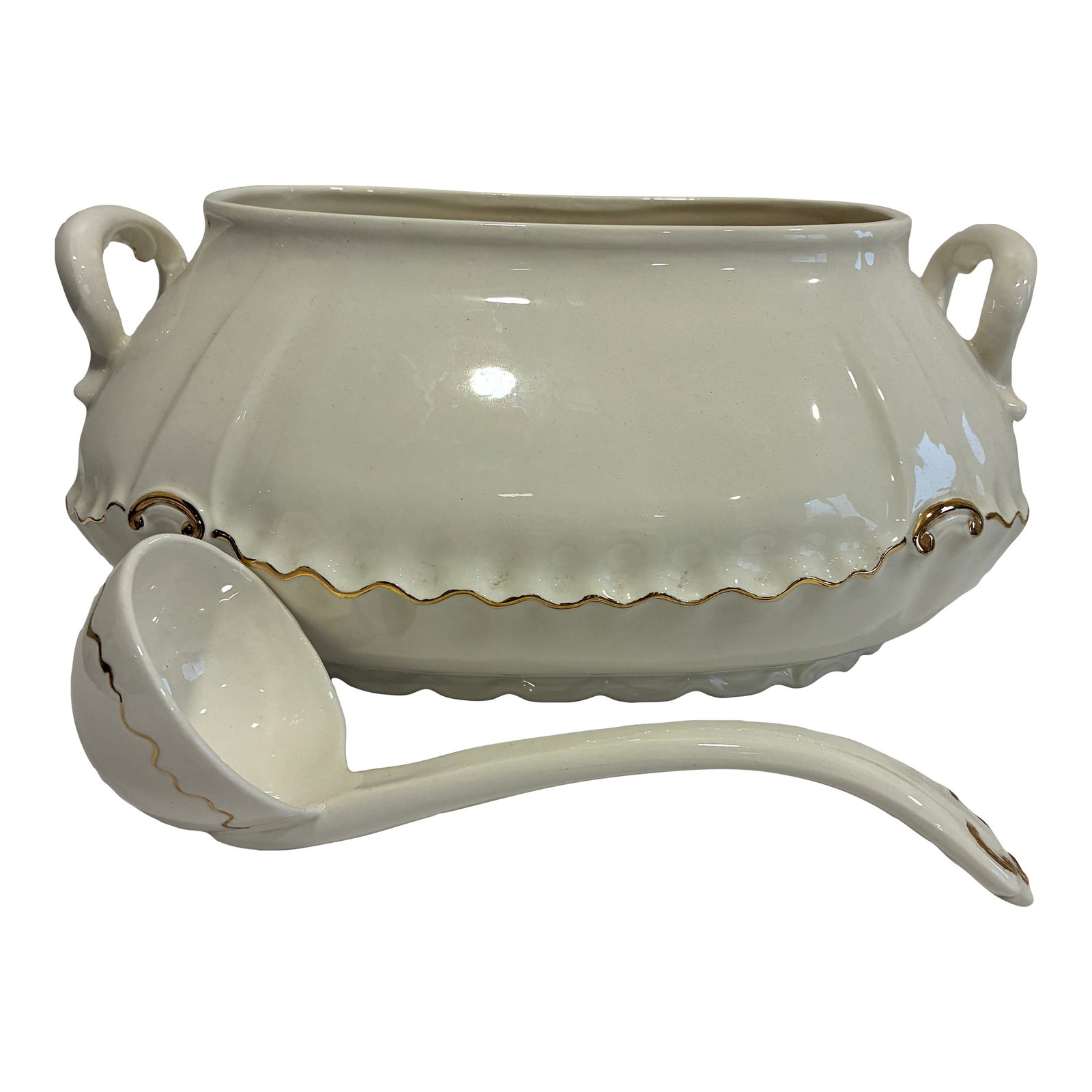 Vintage Ceramic Soup Tureen With Gold Trim and Ladle: A charming vintage ceramic soup tureen featuring a soft cream glaze and elegant gold trim detailing. This classic serving piece includes two decorative side handles and a coordinating ceramic ladle,
