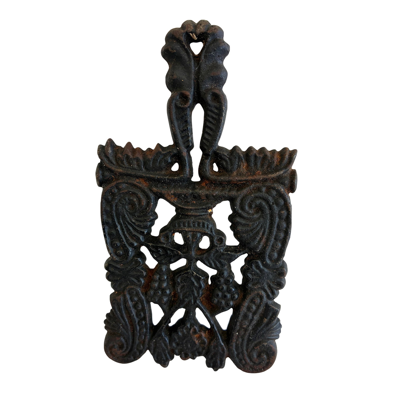 Vintage Cast Iron Grape and Vine Trivet: This vintage cast iron trivet features an intricate grape and vine design with scrolling details and a beautifully aged patina. The solid iron construction gives it both durability and decorative