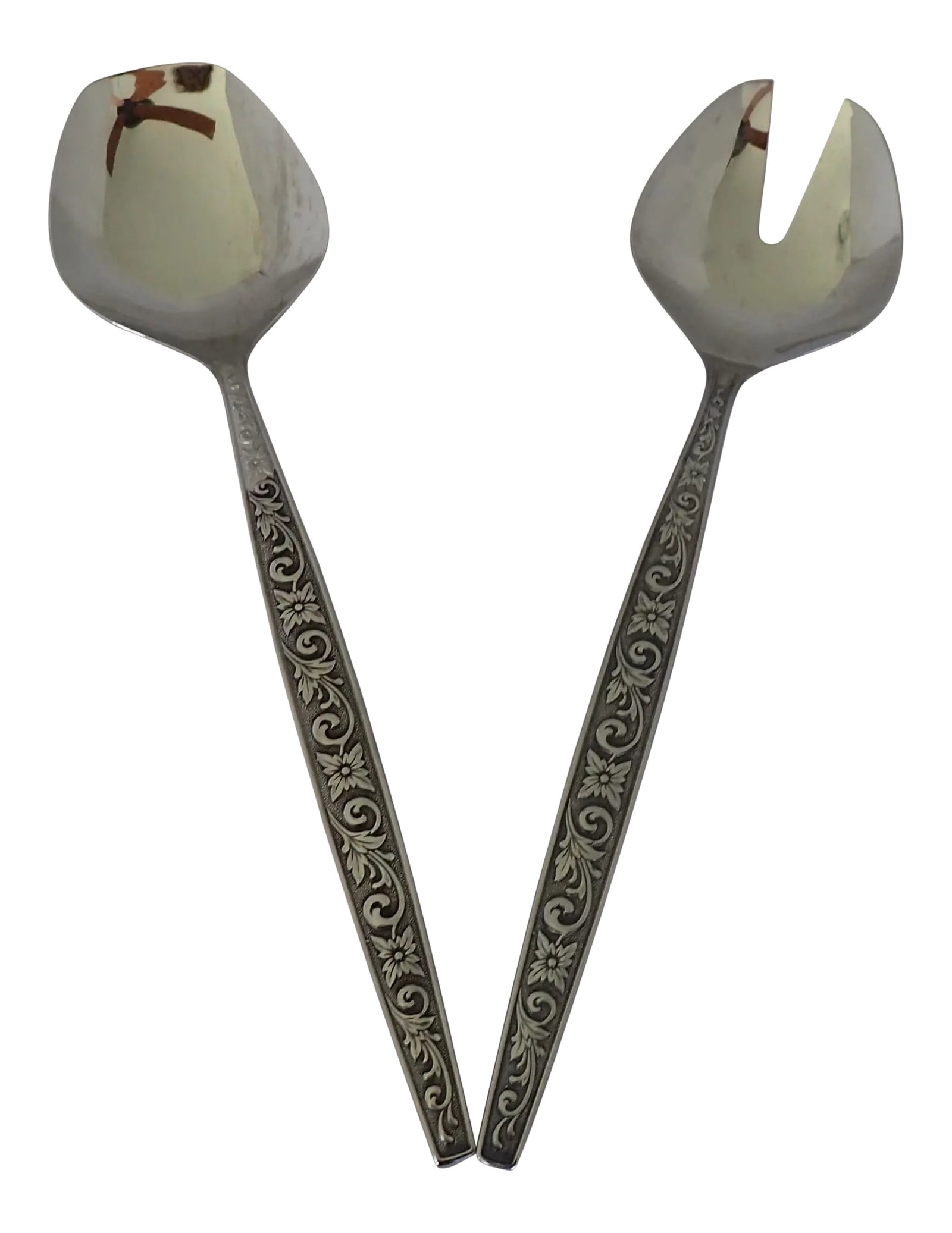 Floral Stainless Serving Fork & Spoon: Vintage elegant floral heavy serving spoon and fork, makers mark reads " Stainless Steel JAPAN" Excellent! Condition: Alterations: Original Condition Unaltered Imperfections: Some Imperfections
