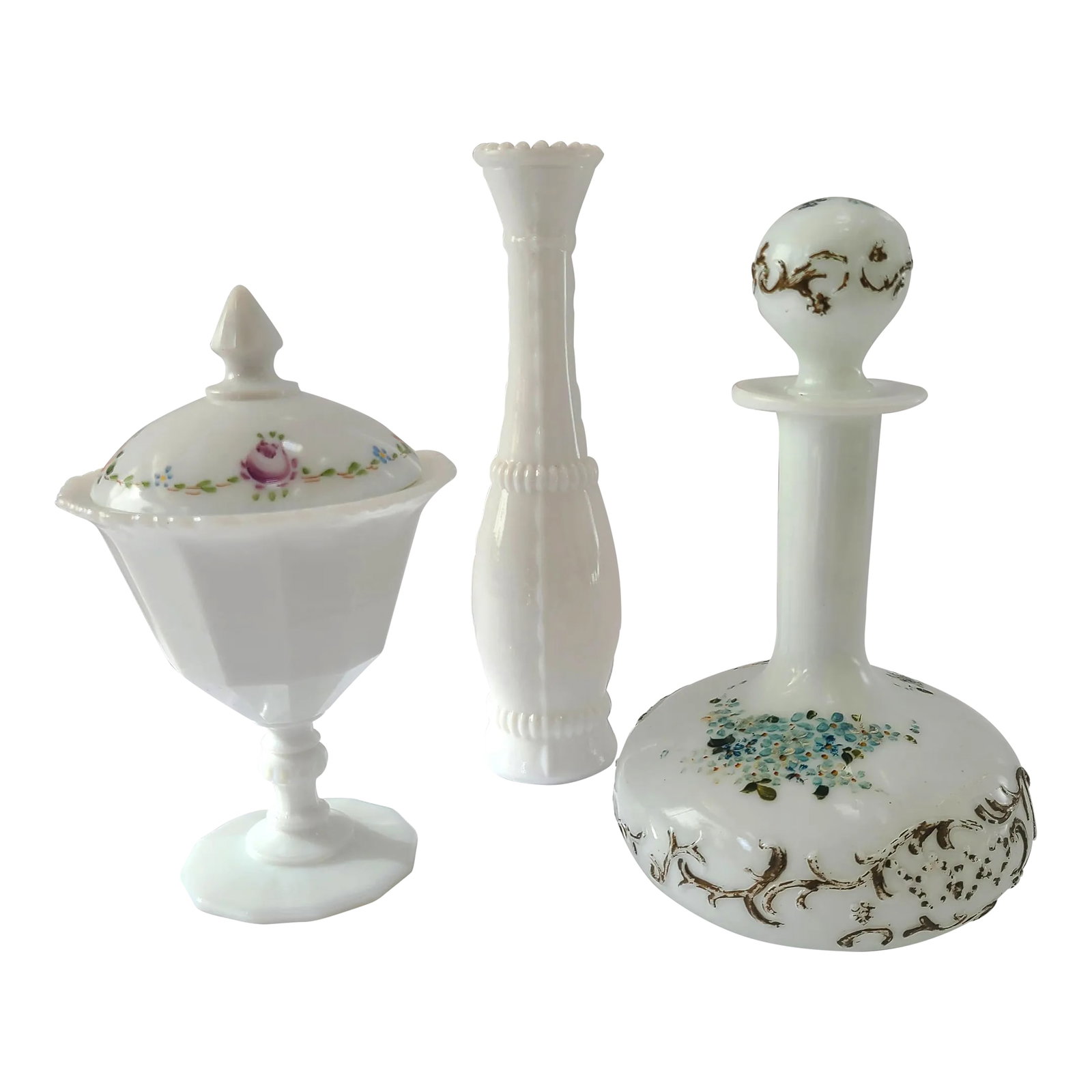 Early 20th Century Hand-Painted Milk Glass Set- 3 Pieces: Three Pieces: Antique Hand Painted Victorian Milk Glass Barber Bottle Hand Painted Embossed 10" X 6" w Stopper; Hand Painted Covered Candy Dish Floral Decorations 8 5/8" (h) x 5.5" upper diameter x