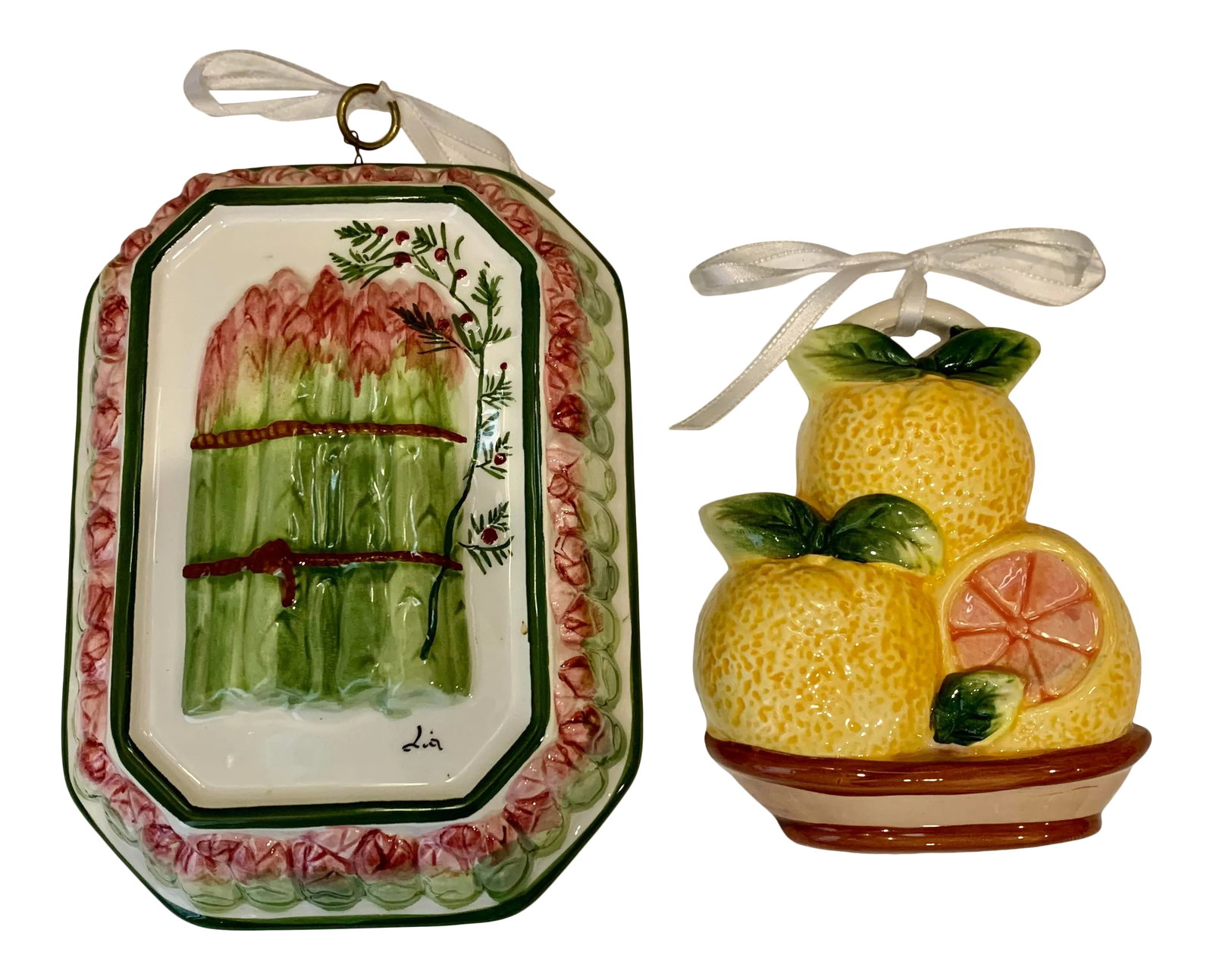 2000s Asparagus & Citrus Ceramic Mold/Wall Decor- Set of 2: Hand painted Ceramic asparagus mold with majolica glaze. High Quality- made in Italy Signed by artist. / wall hanging decoration. Made in Italy . measures 8" x 2" x 7.5" Citrus / Great fruit Ceramic
