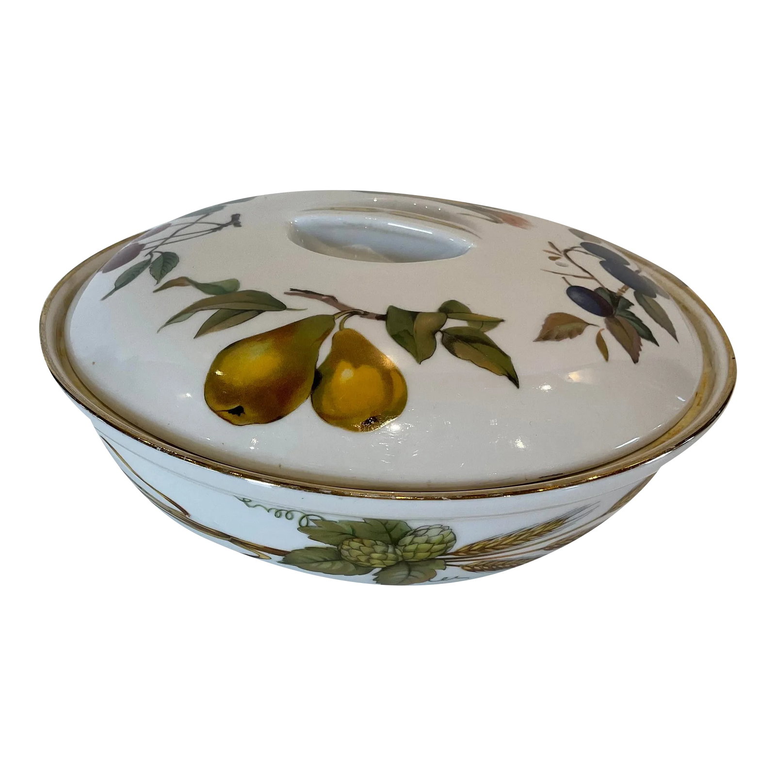 1960s Royal Worcester Evesham Lidded Casserole: Iconic Evesham Gold pattern by England's Royal Worcester. The pattern is world-known for its fruits, vegetables and nuts in several variations.. It was produced between 1961-2015 and has been disconti