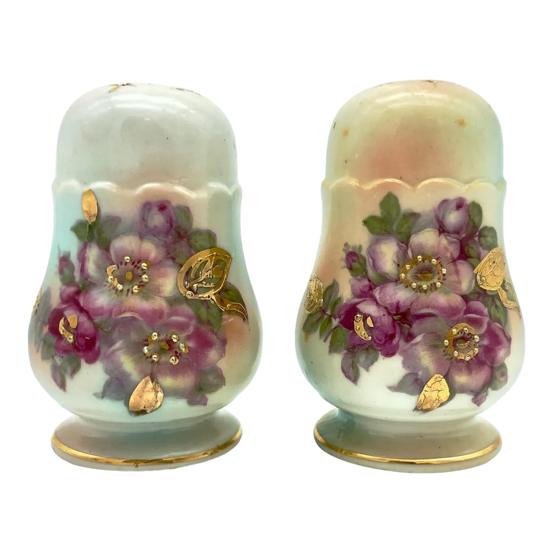 Vintage Porcelain Salt & Pepper Shakers With 24k Gold Details: Stunning salt and pepper shaker featuring flower motifs with 24k gold leaves. Condition: Alterations: Original Condition Unaltered Imperfections: Some Imperfections Condition Notes: In good