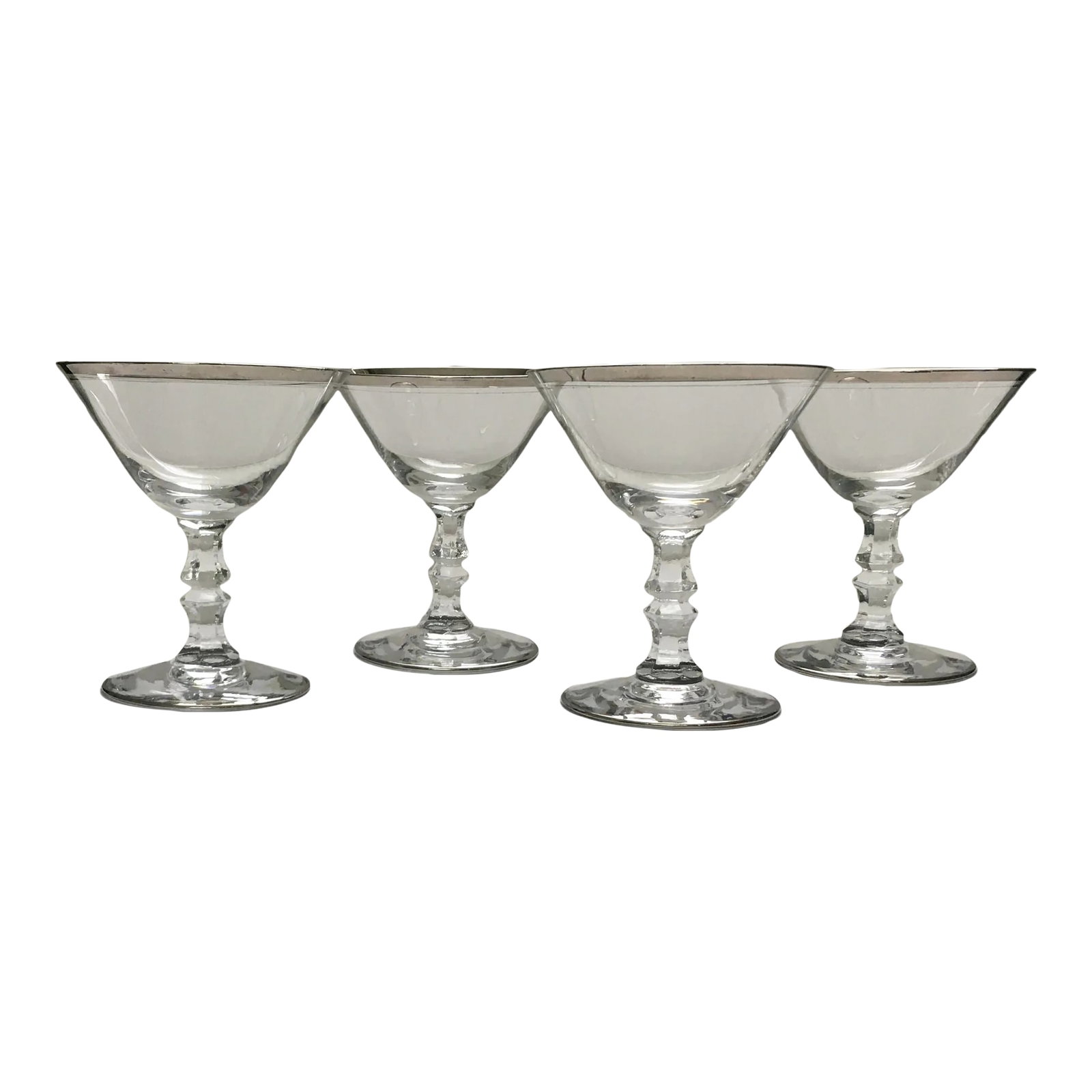 1960s Silver Trimmed Facet Stemmed "Debut" Cocktail Glasses- Set of 4: An elegant set of vintage cocktail glasses in a simple silver trimmed patterned that compliments a variety of styles. Ships within 1-2 days using USPS. All items packed with care. Please contact us