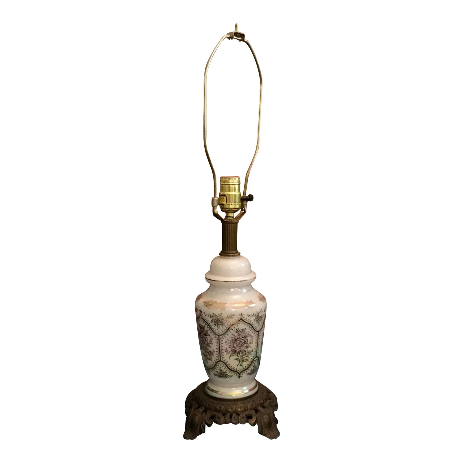 Vintage Mid 20th Century Gold Scrollwork Iridescent Phoenix Glass Table Lamp: A charming iridescent glass table lamp which works like a traditional lamp and lights up at the main bulb but also illuminates separately from the glass base as well to be used as a more subtle light 