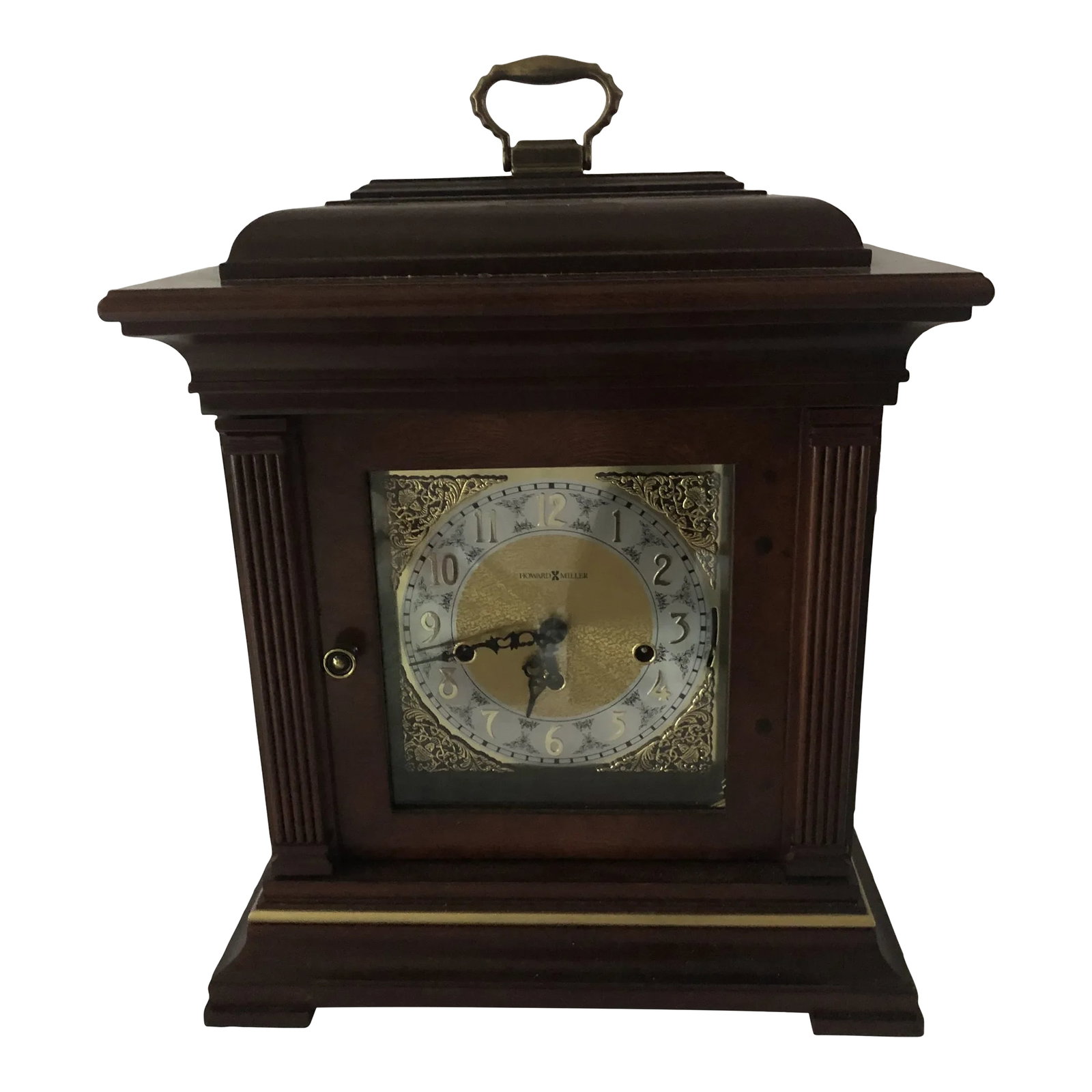 Contemporary Howard Miller Thomas Tompion Mantle Clock: MANTEL CLOCK: Named after the historical Father of English Clockmaking, the Thomas Tompion Clock features a Windsor Cherry finish on select hardwoods and veneers to compliment your home decor. Place