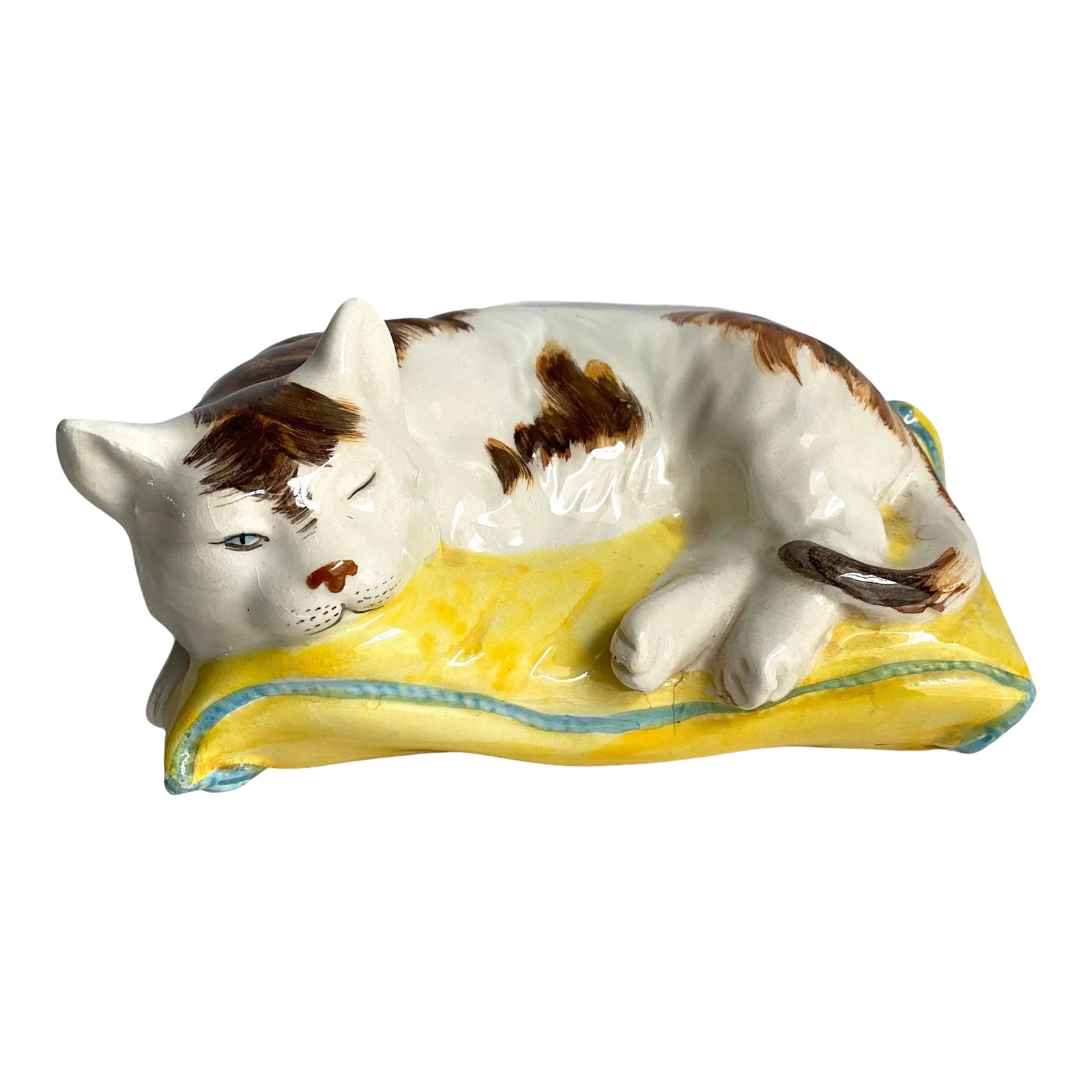Vintage Italian Calico Cat Sleeping on Pillow Ceramic Hand Painted Made in Italy: Mid Century 1960s Italian Calico Cat Sleeping On Pillow Ceramic Made In Italy Such an adorable kitty statue / figurine, would look great on a coffee table or bookshelf. Signed Italy 2304 Condition: Al