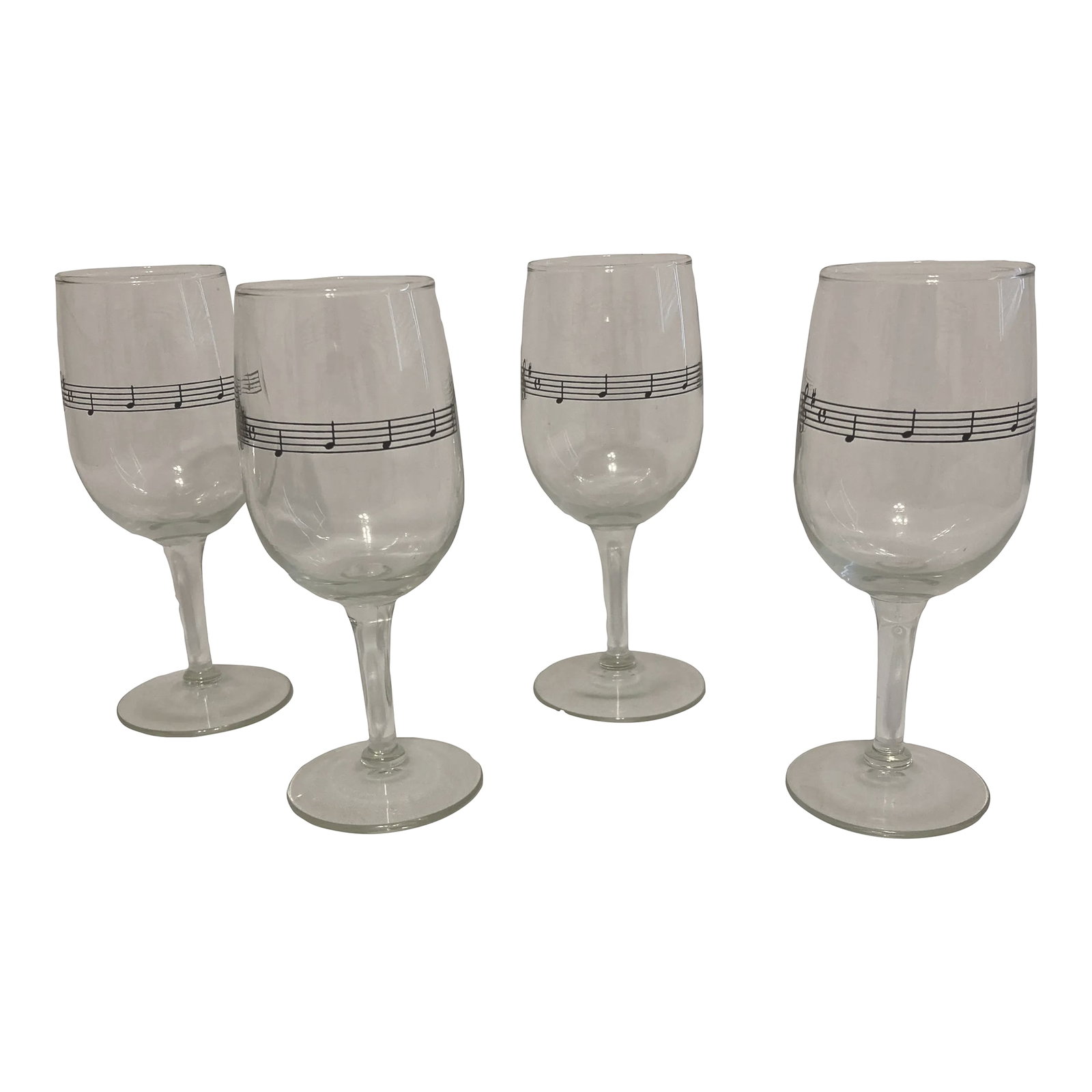 Vintage Music Note Wine Glasses, Set of 4: Enhance your collection with this set of four vintage musical note wine glasses, adorned with charming black musical staff patterns on clear glass. A standout among vintage finds, these glasses offer 