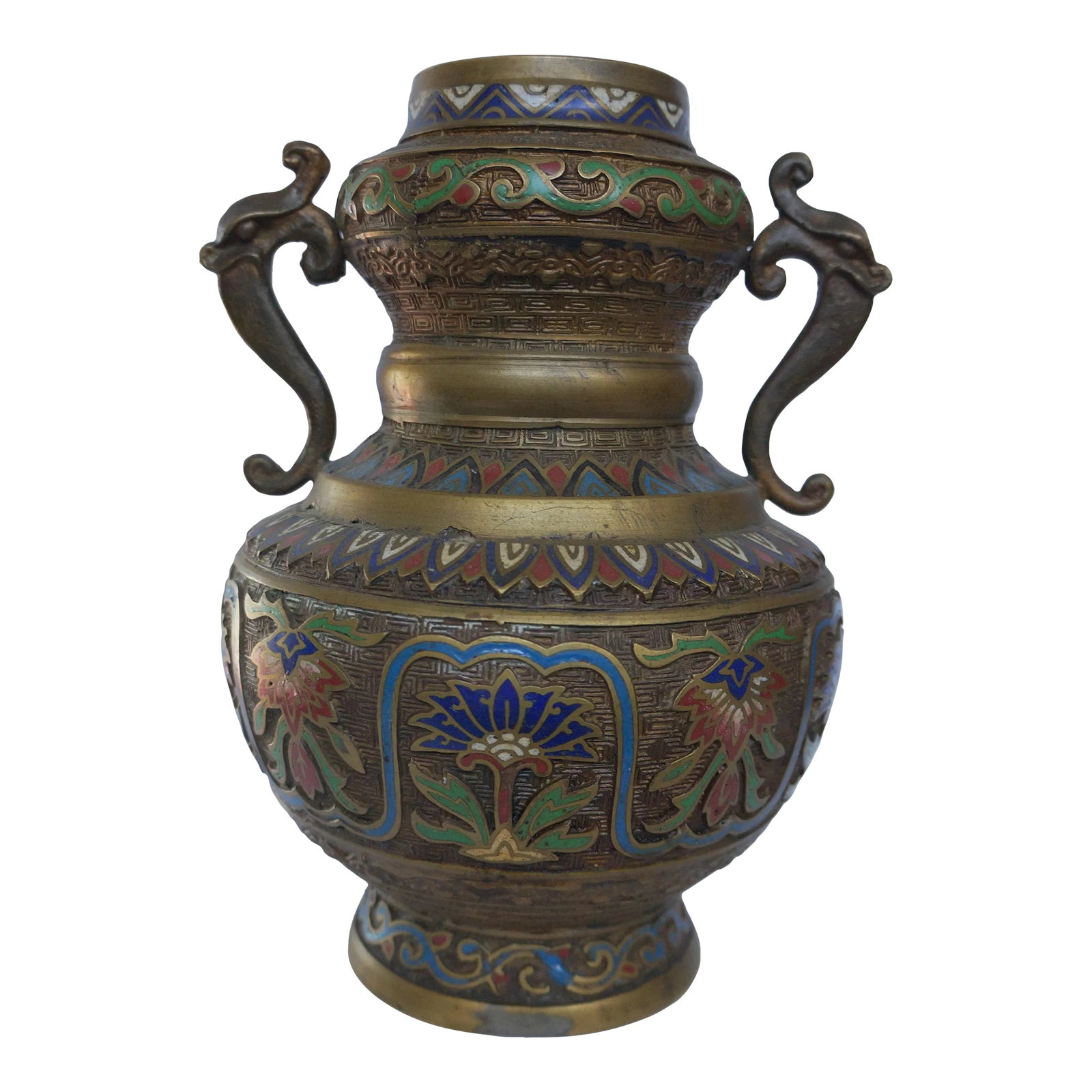 Vintage Japanese Champleve Vase: Champleve is an old technique of enamel decoration of metal objects. In this instance, the artisan incised designs on the background of an object . Enamel is applied and fired in the depressed areas.