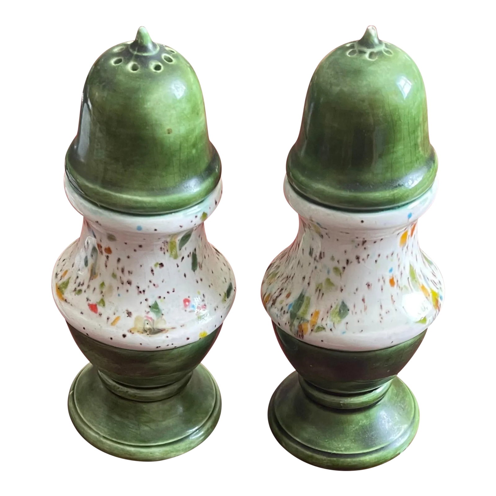 Vintage Green Multicolored Glaze Ceramic Salt & Pepper Shakers- a Pair: A pair of salt and pepper shakers in a colonial revival shape with a green foot and top and a rainbow speckled white glaze in the center. Ships within 1-2 days using USPS. All items packed with care.